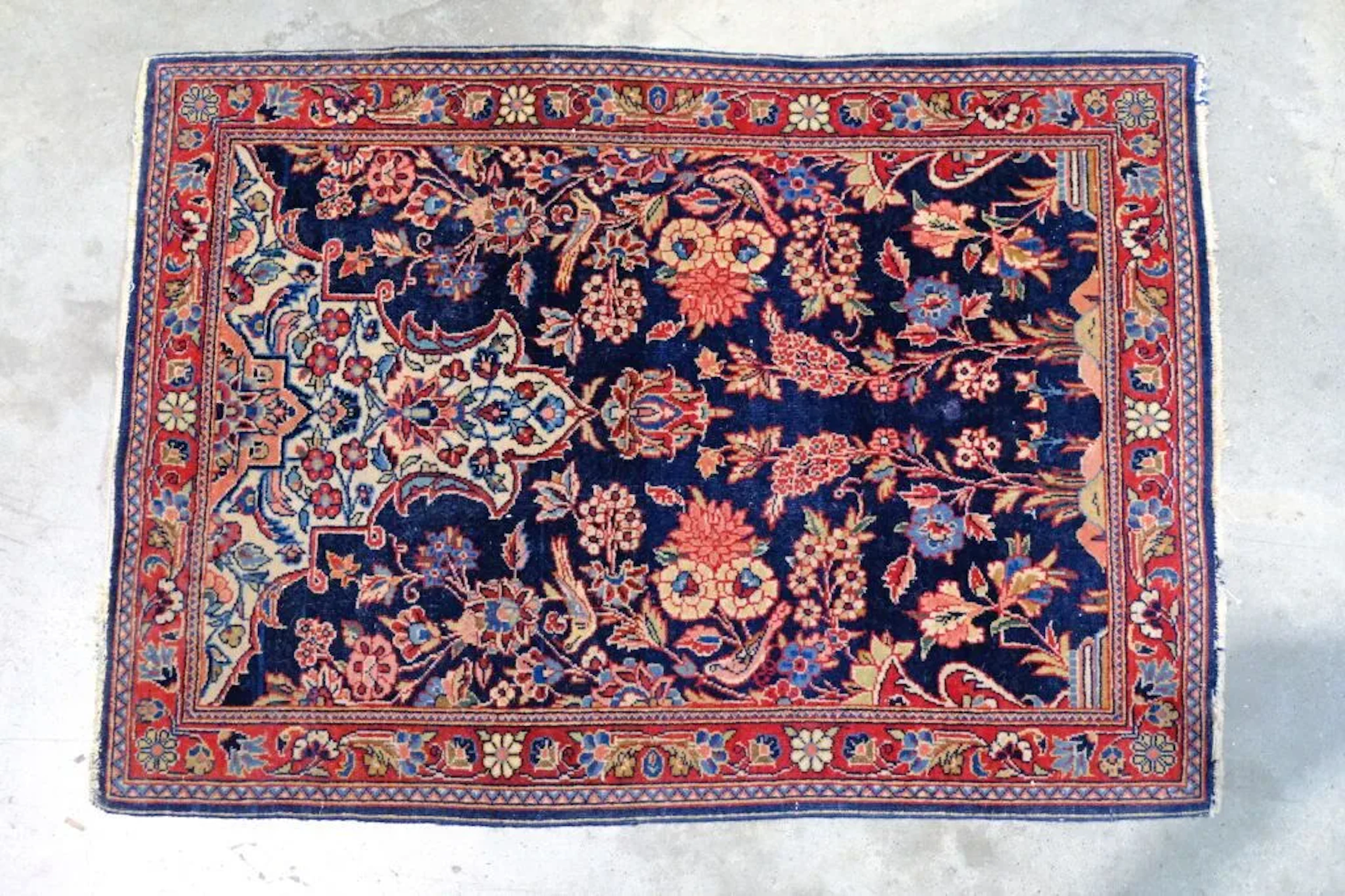 Iran or Turkey. A rug likely made of wool and silk, featuring a design