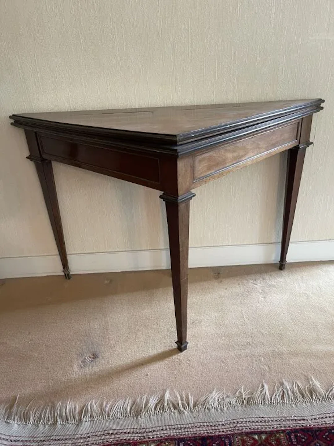 Triangular folding game table made of mahogany veneer, with a removable