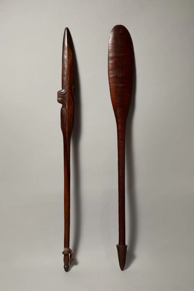 Club with a flattened head and tapered handle. Heavy wood with a superb