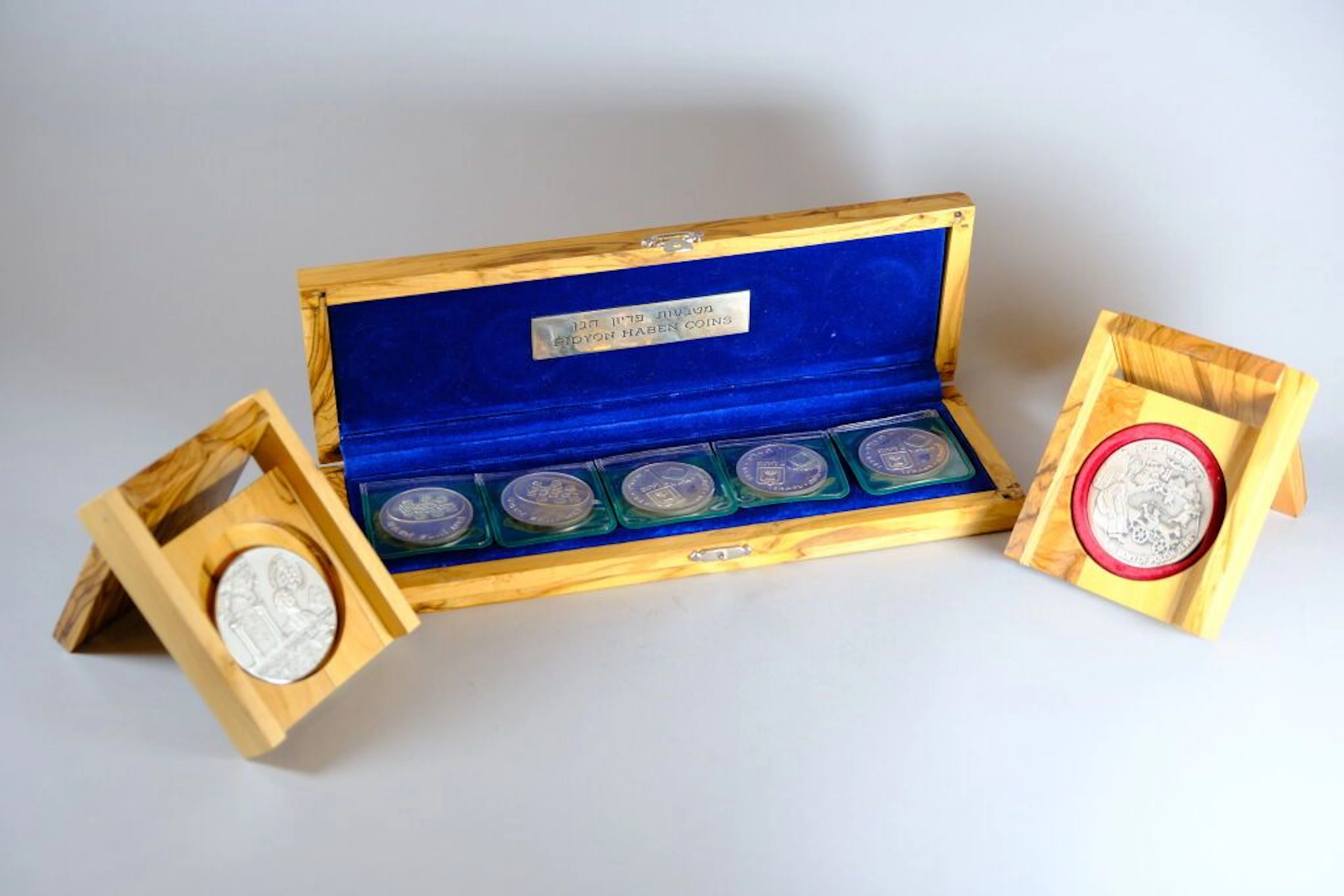 [NUMISMATICS]; [JUDAICA] A natural wood box lined with blue velvet