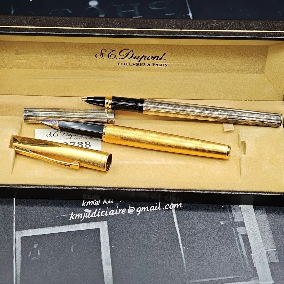 Epistolary lot including: - S.T. DUPONT: a silver-plated metal ballpoint