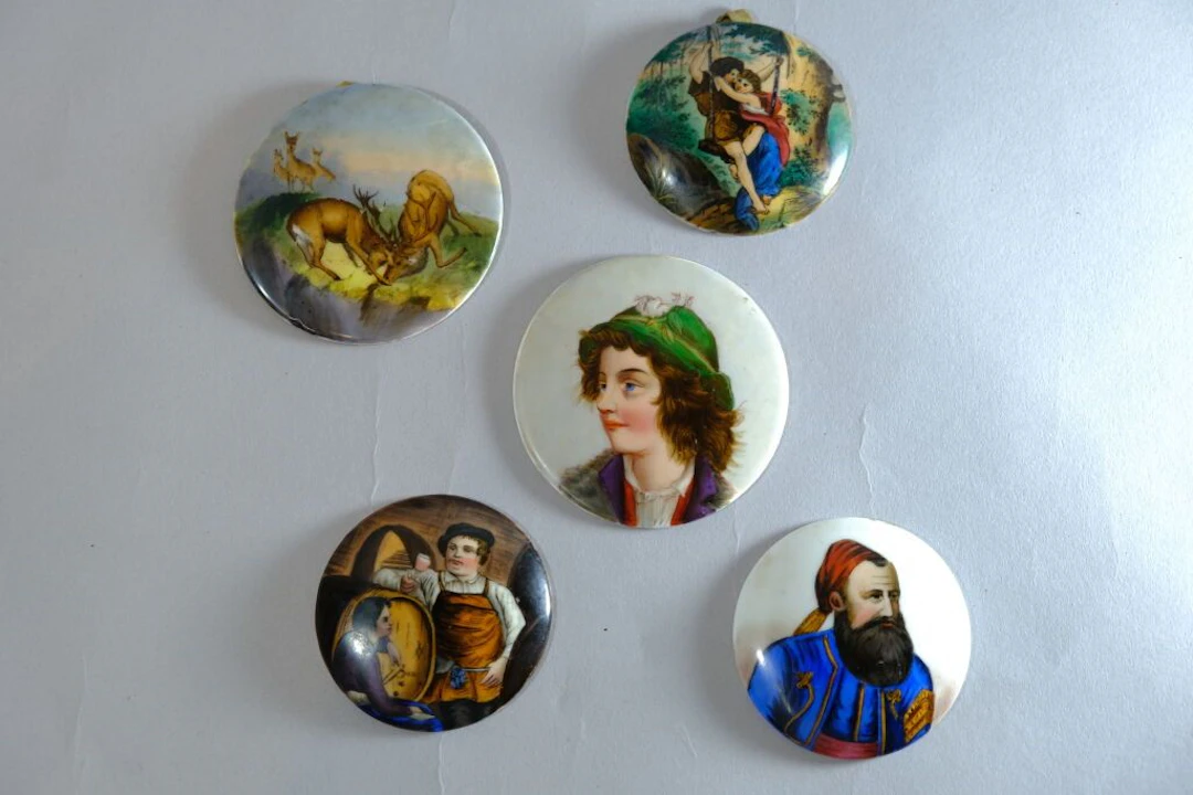 Set of 5 painted porcelain plates from the 19th century, including: