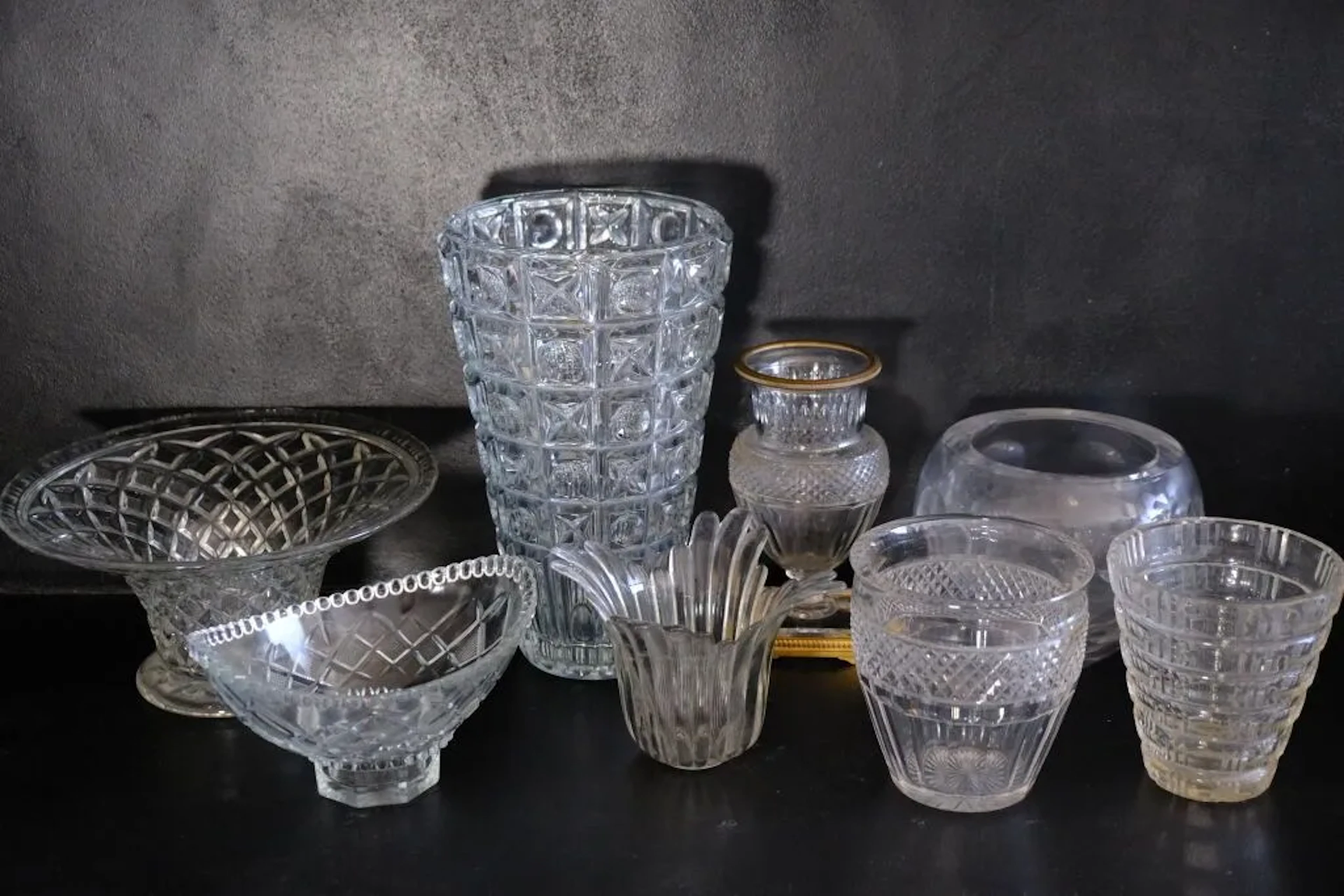 Set of seven vases or trinket bowls made of cut crystal and glass