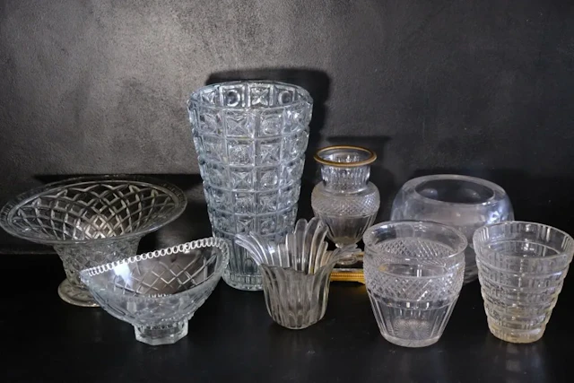 Set of seven vases or trinket bowls made of cut crystal and glass