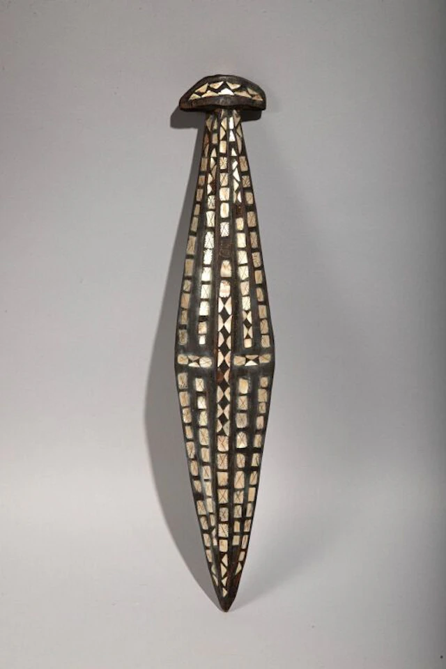 Short club entirely inlaid with mother-of-pearl. Solomon Islands
