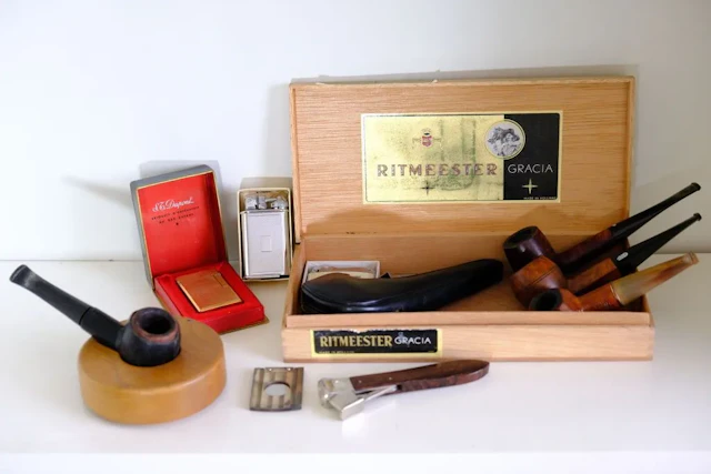Tobacco collection comprising: - a DUPONT lighter made of gold-plated