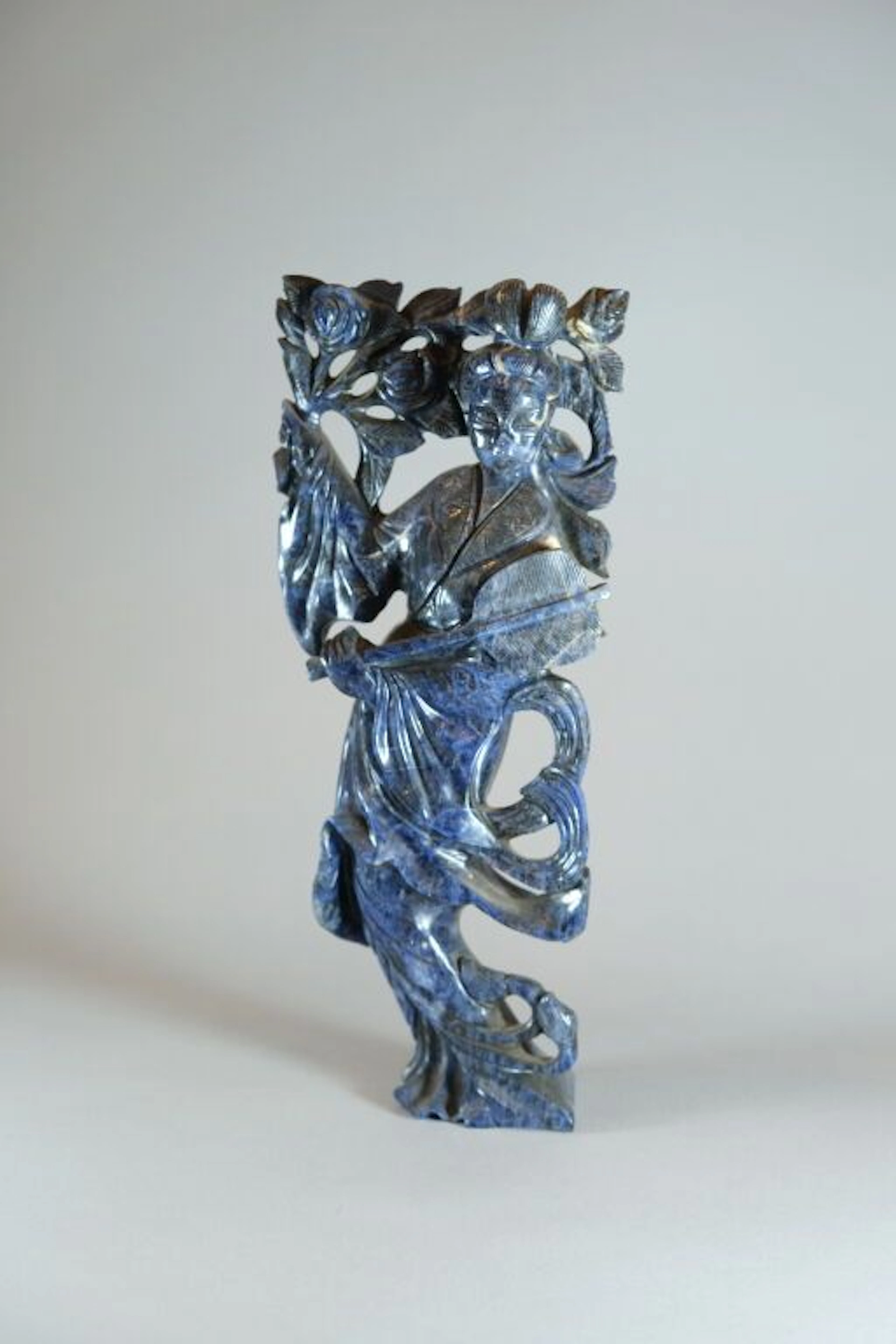 CHINA, 20th century. Female deity carved from lapis lazuli, wearing
