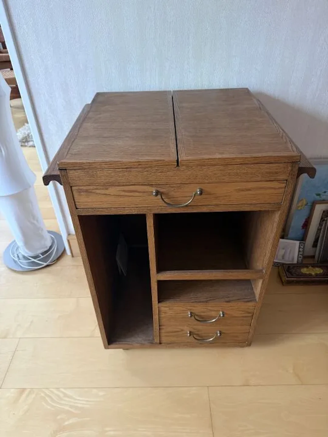 Small artist's studio cabinet for storing your art supplies. Hinged