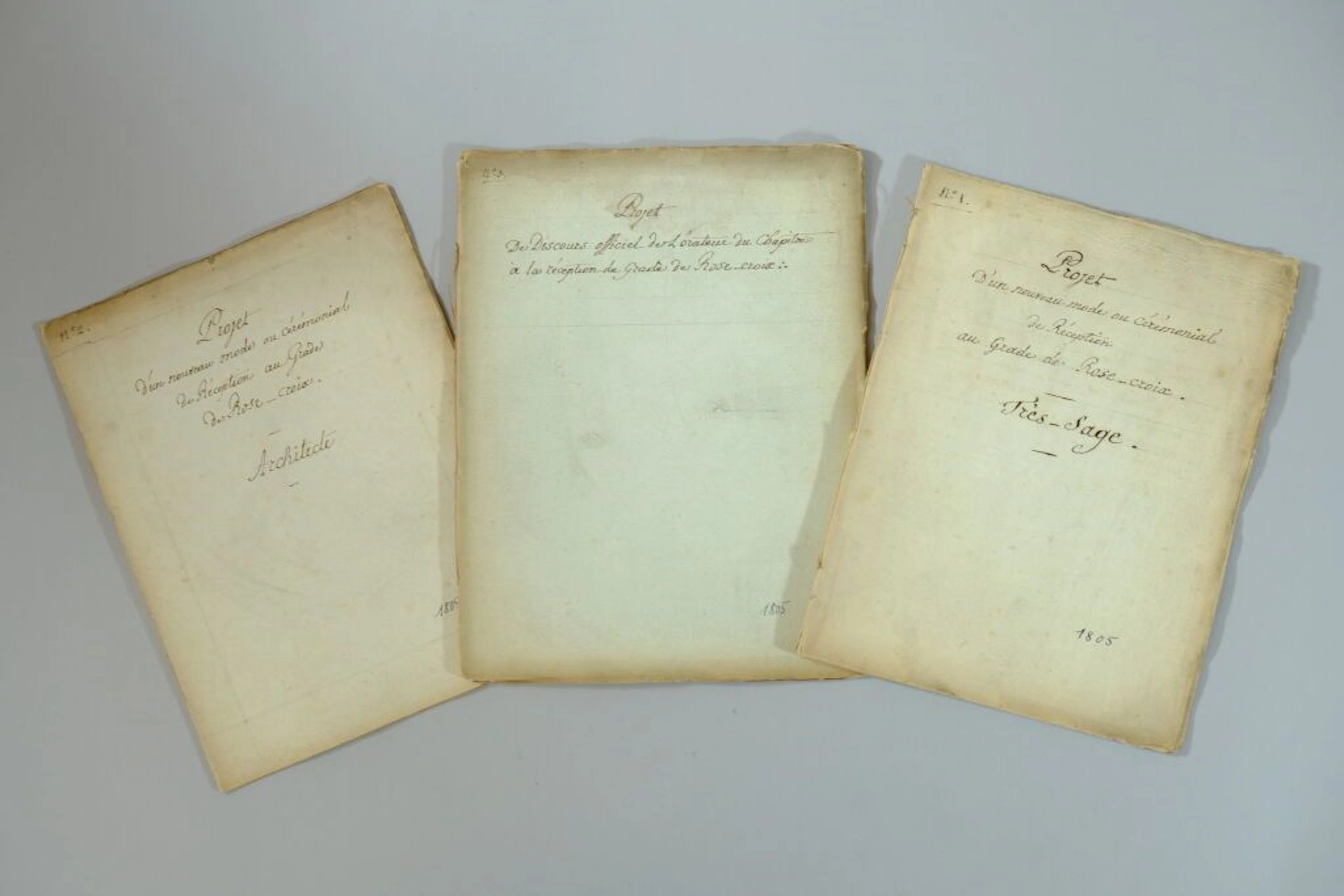 A set of three handwritten booklets concerning the implementation