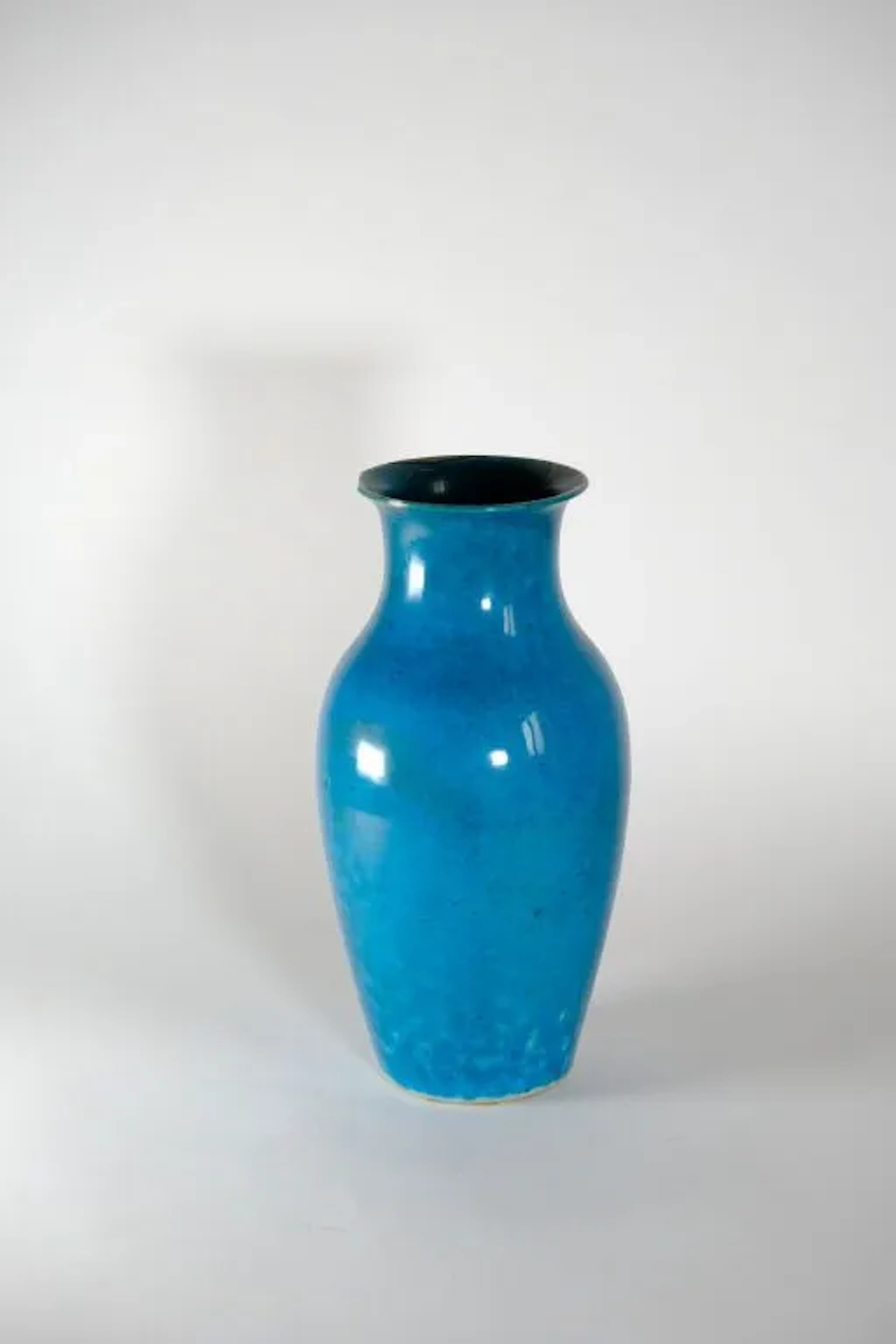 CHINA. Turquoise-glazed biscuit baluster vase. 18th–19th century.
