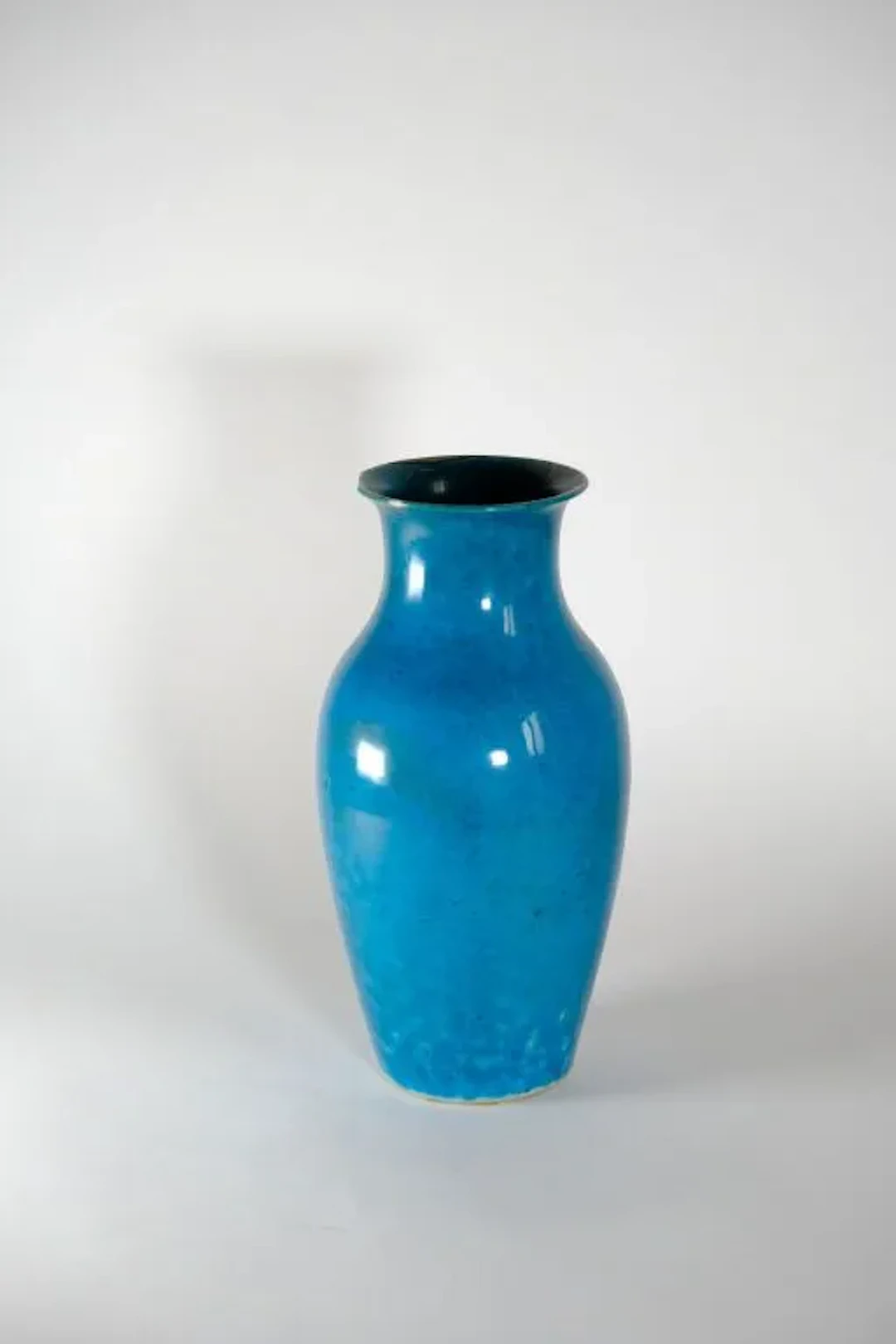 CHINA. Turquoise-glazed biscuit baluster vase. 18th–19th century.