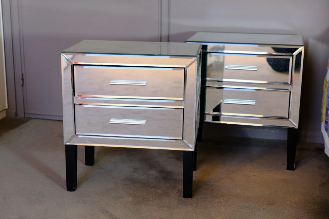 Pair of modernist-style nightstands with glass-top fronts featuring
