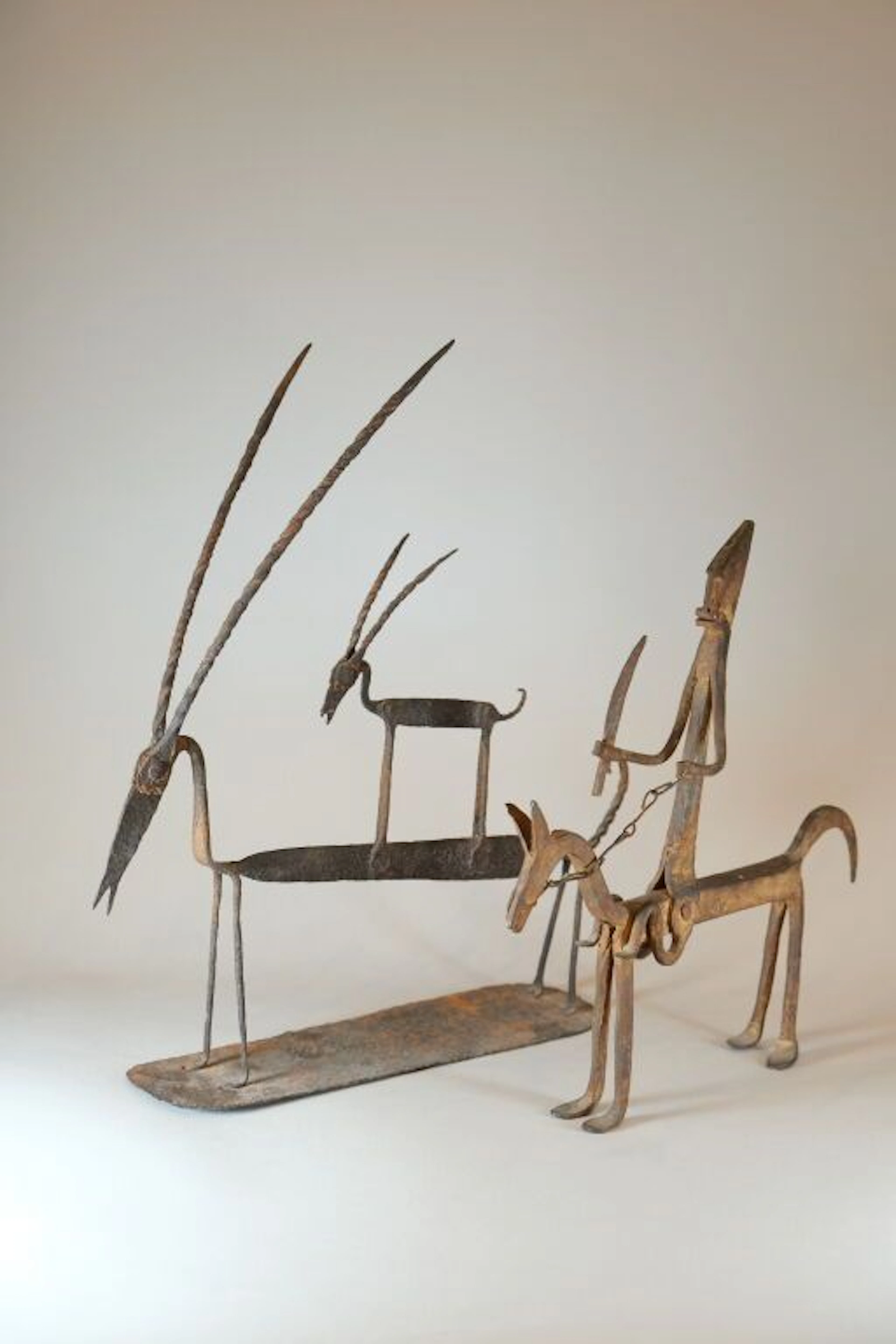 20th-Century School. The Rider and The Two Gazelles. Set of two wrought-iron