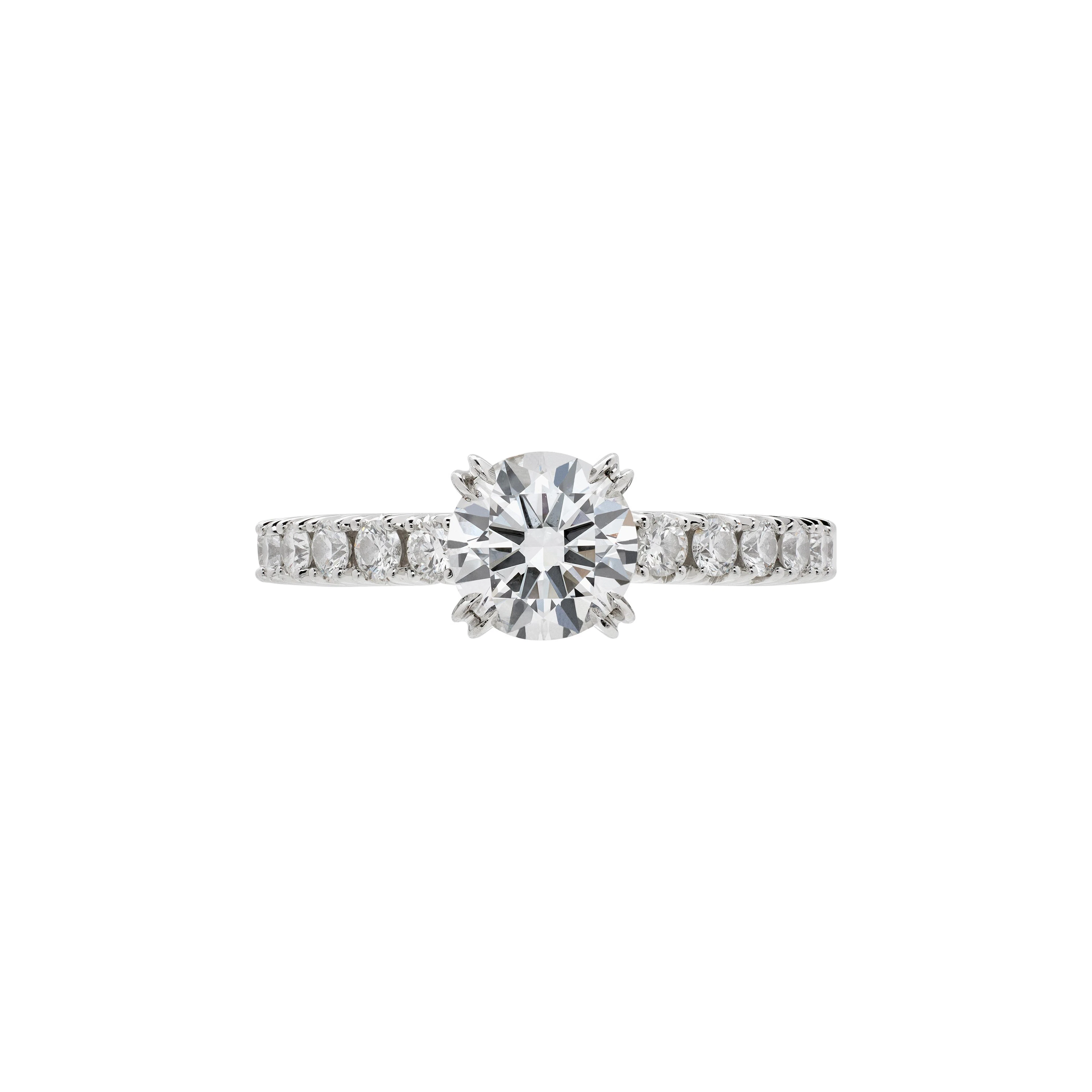 Platinum, 0.73ct Round Brilliant Cut Diamond and Diamond Engagement Ring