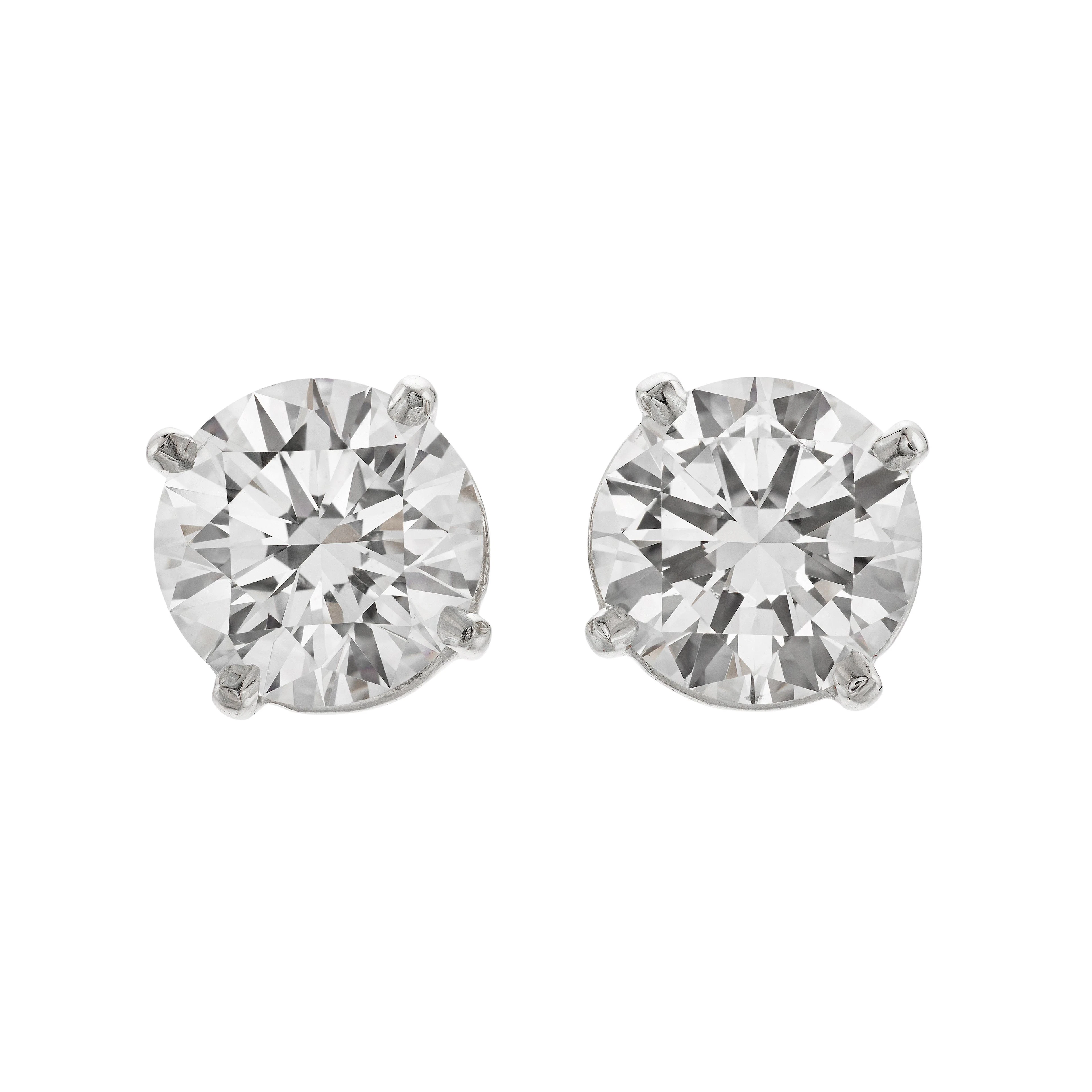 Platinum and 3.04ctw Round Brilliant Cut Diamond Stud Earrings
