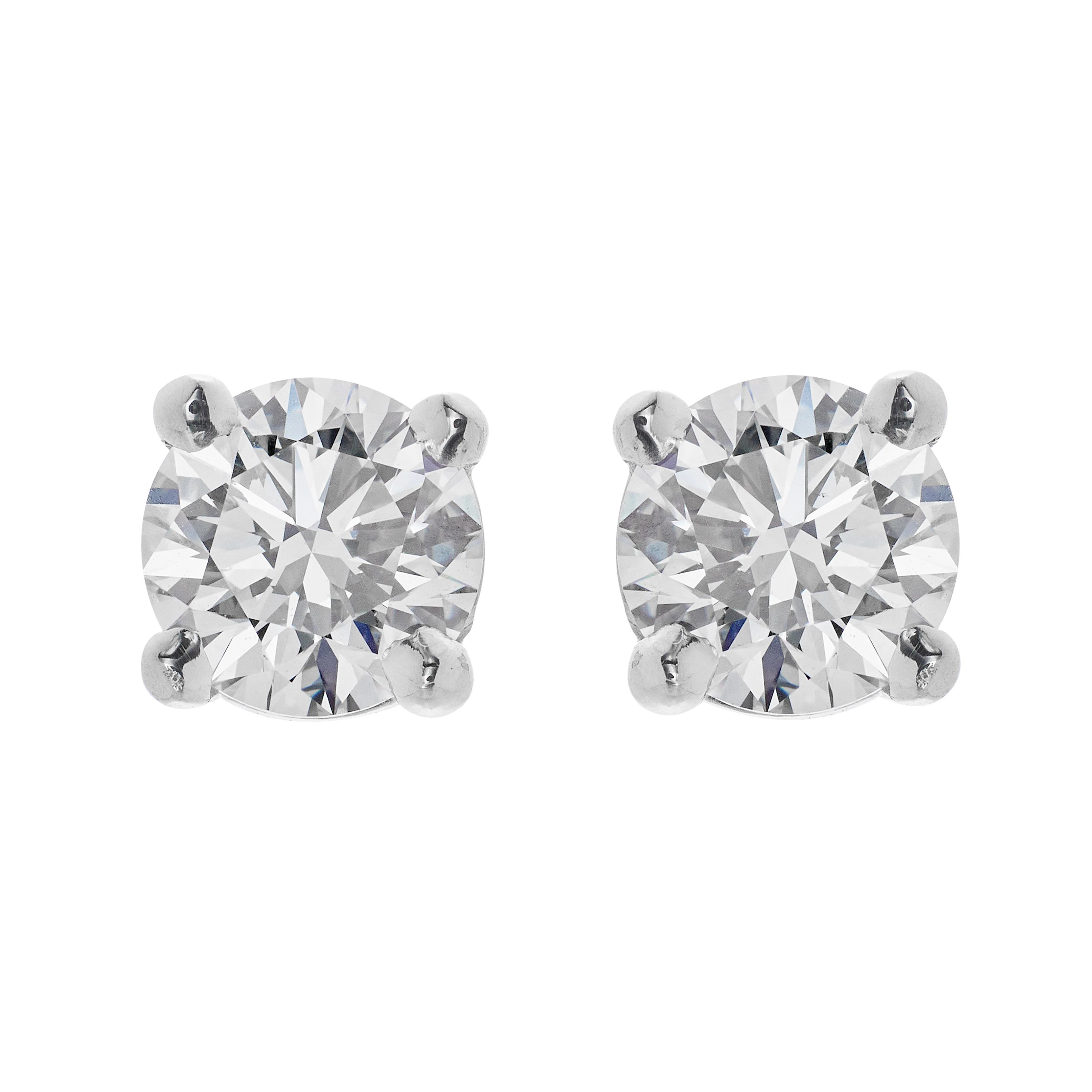 Platinum and 1.14ctw Round Brilliant Cut Diamond Stud Earrings