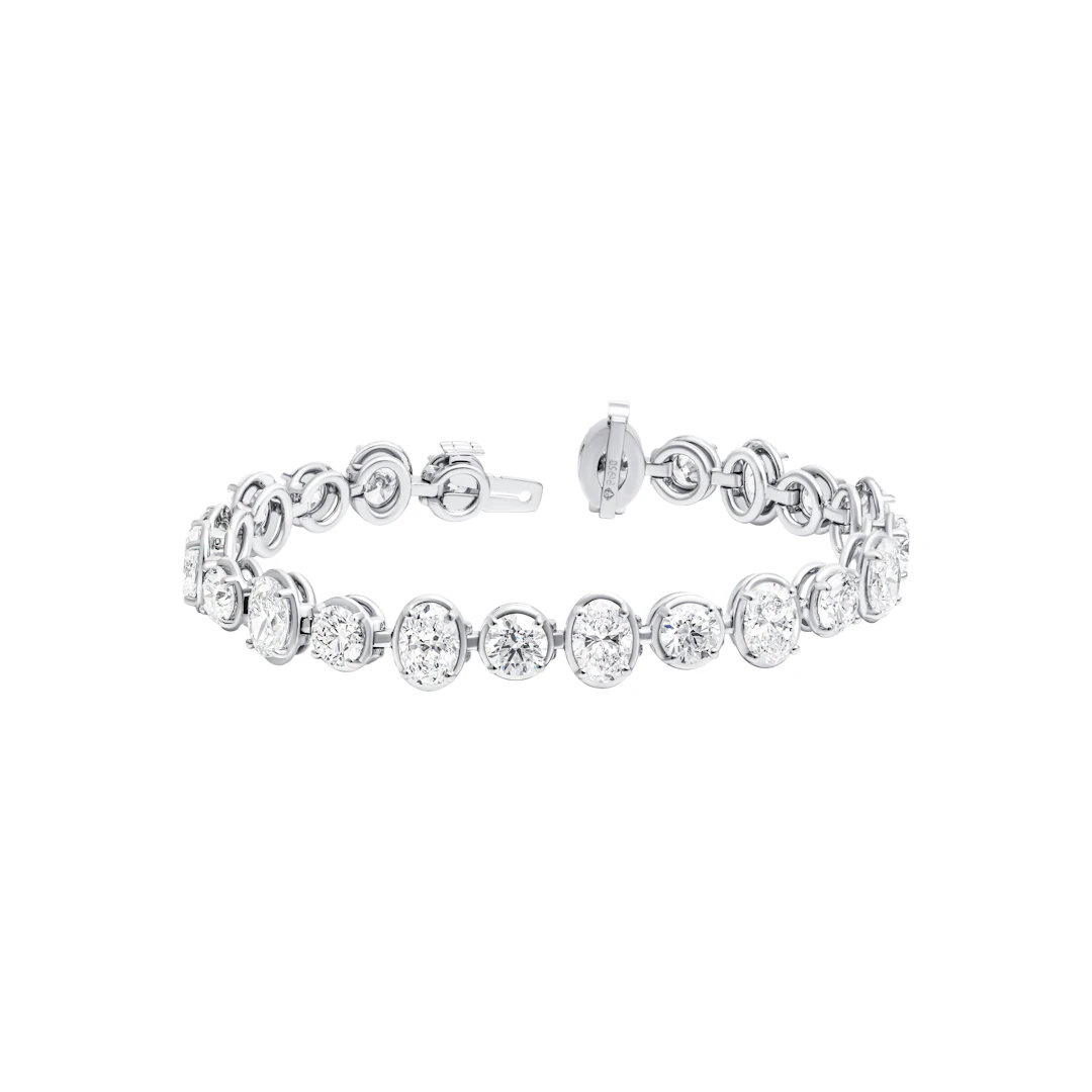 Platinum and 13.26ctw Oval and Round Brilliant Cut Diamond Tennis Bracelet