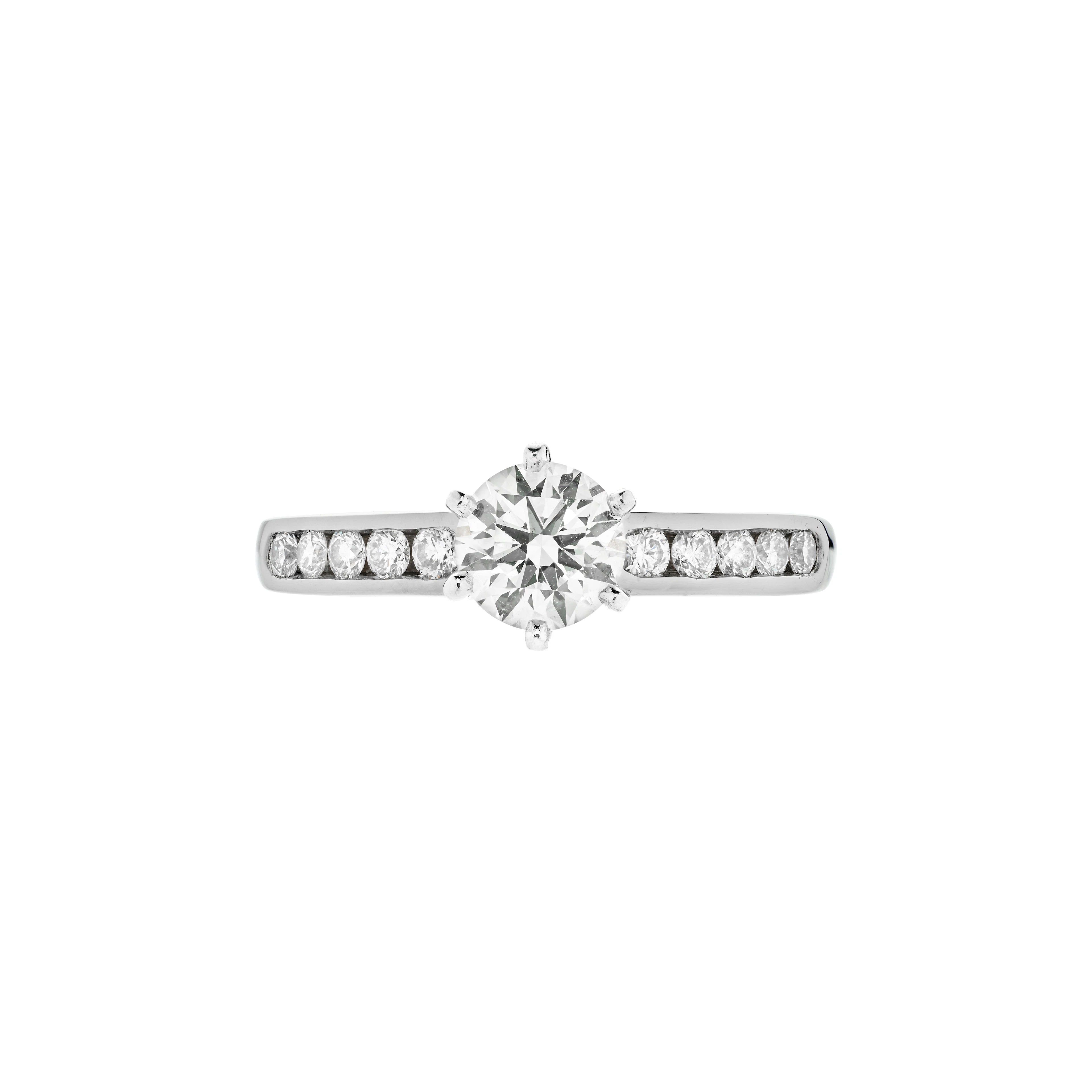 Platinum and 0.94ct Round Brilliant Cut Diamond Engagement Ring