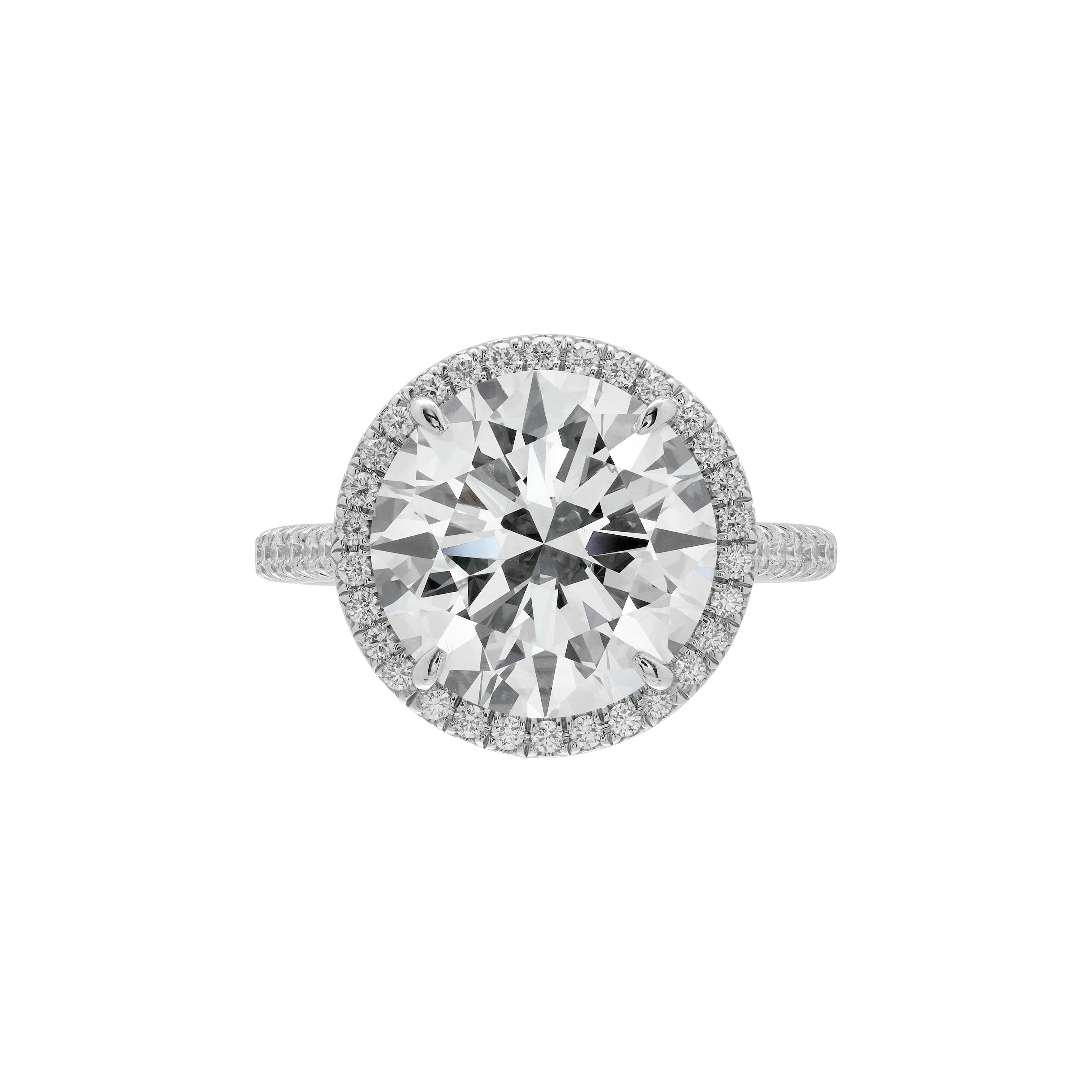 Platinum, 5.00ct Round Brilliant Cut Diamond and Diamond Soleste Engagement
