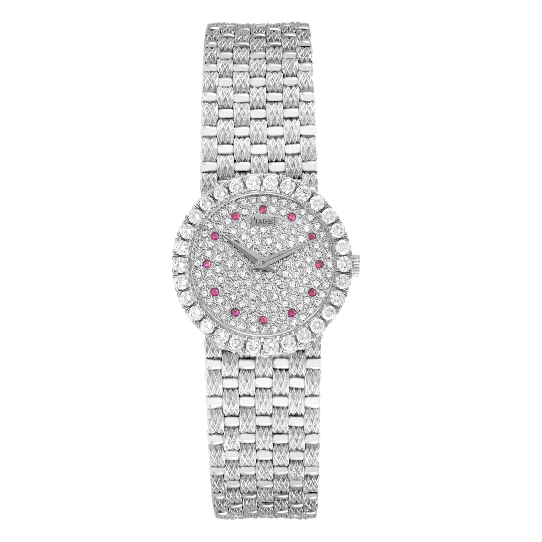 Tradition (Reference 9190D23). A 25mm white gold and diamond-set manual