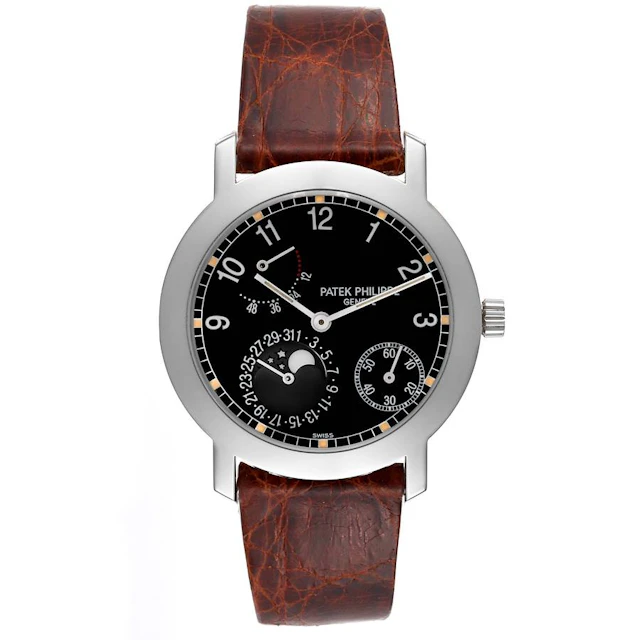Complications (Reference 5055G-001). A 36mm white gold automatic wristwatch