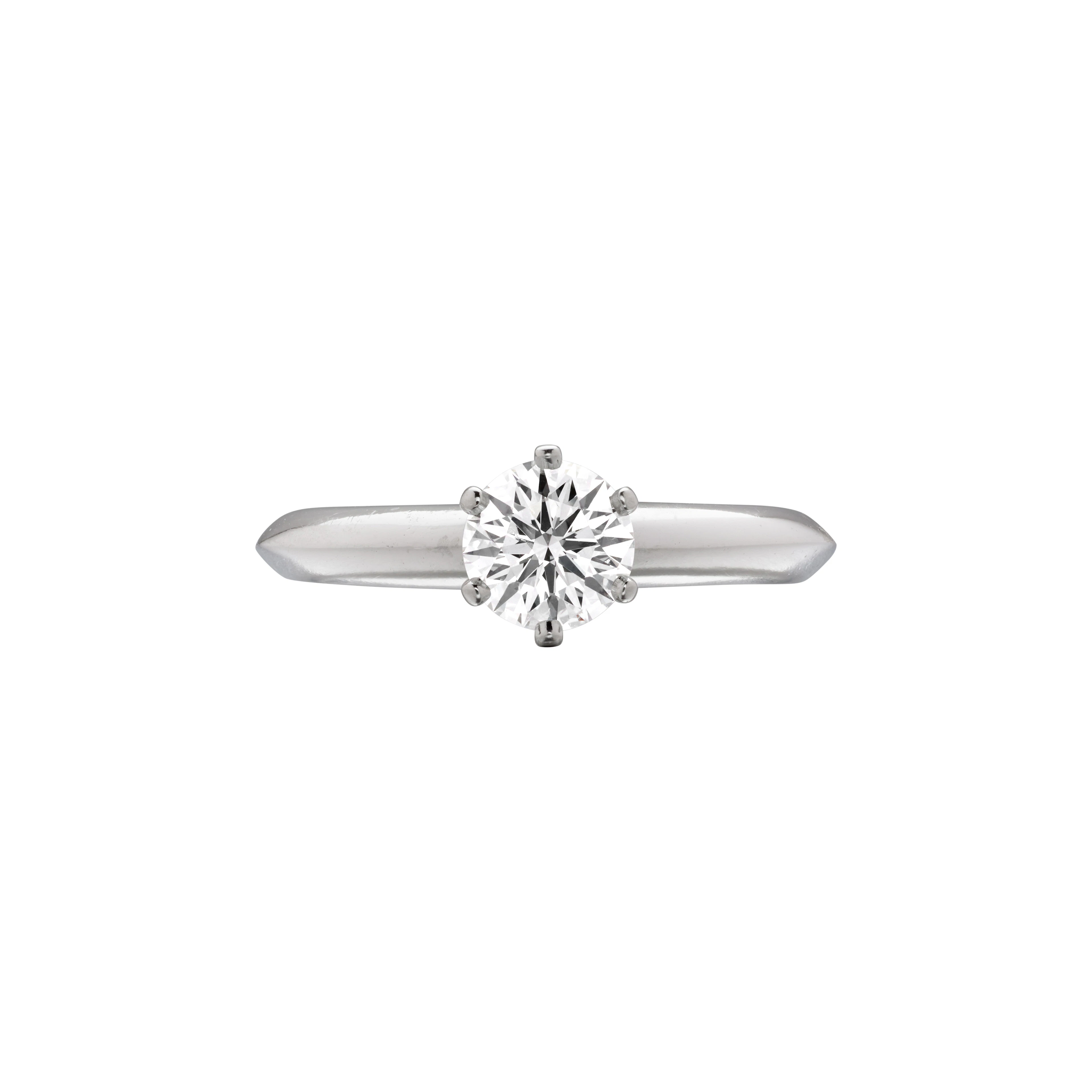Platinum and 0.63ct Round Brilliant Cut Diamond Engagement Ring