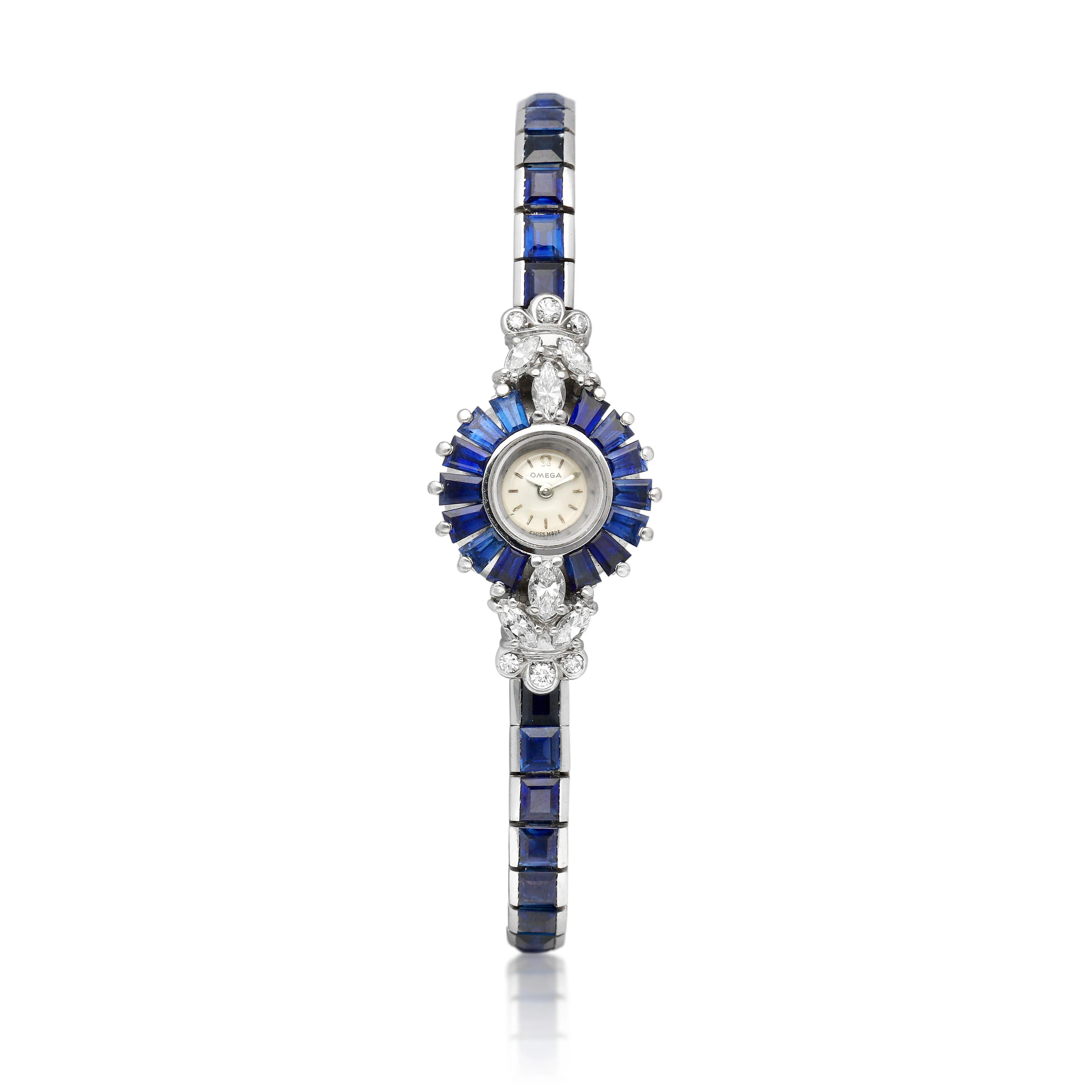 Omega. A white gold, diamond and sapphire-set manual wind bracelet