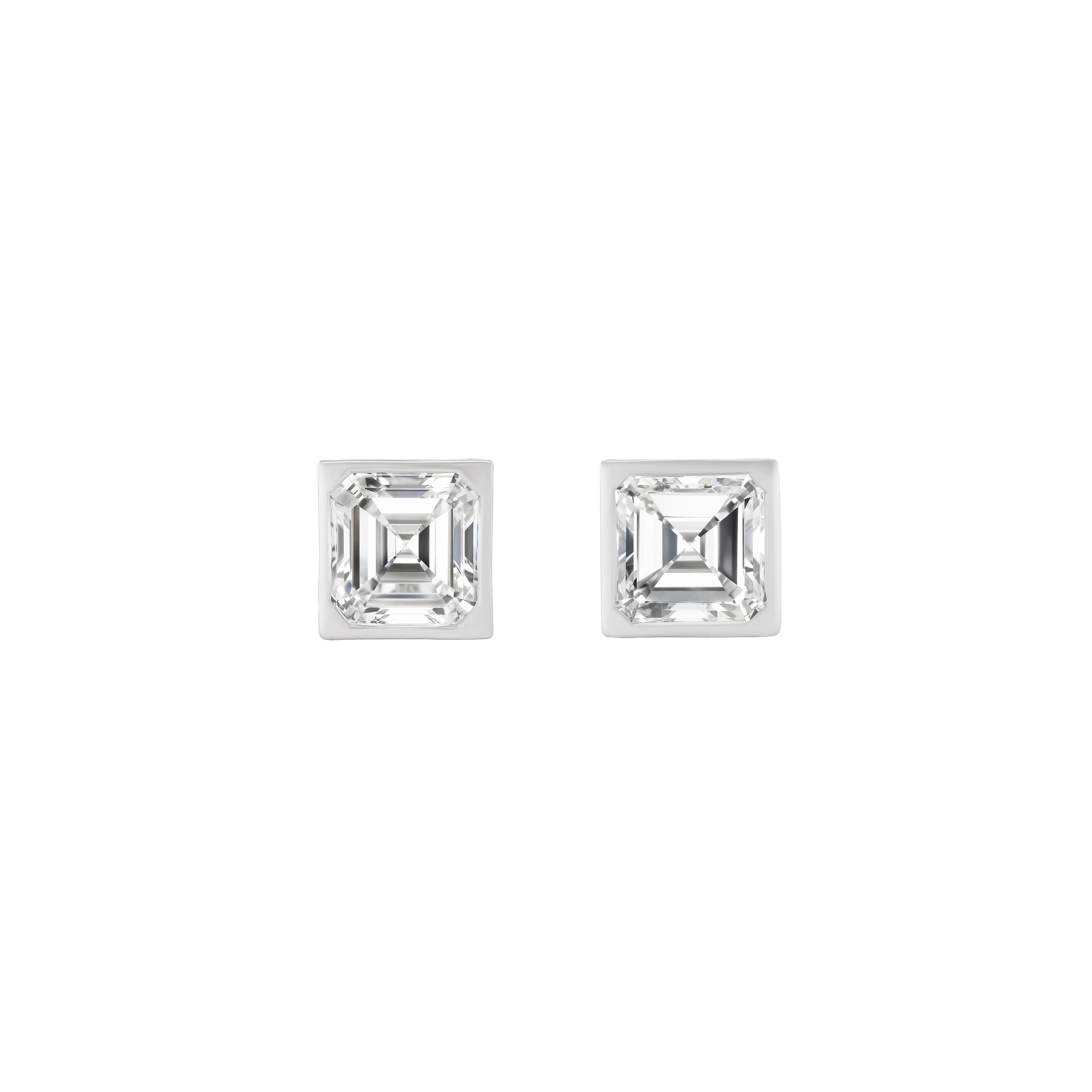 Platinum and 2.64ctw Emerald Cut Diamond Stud Earrings