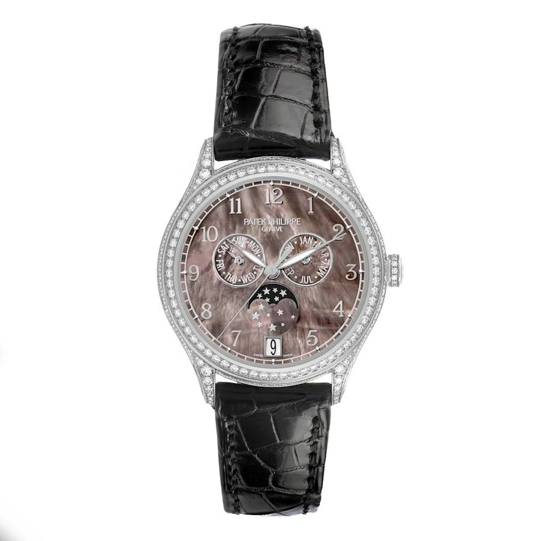 Complications (Reference 4948G). A 38mm white gold diamond-set automatic