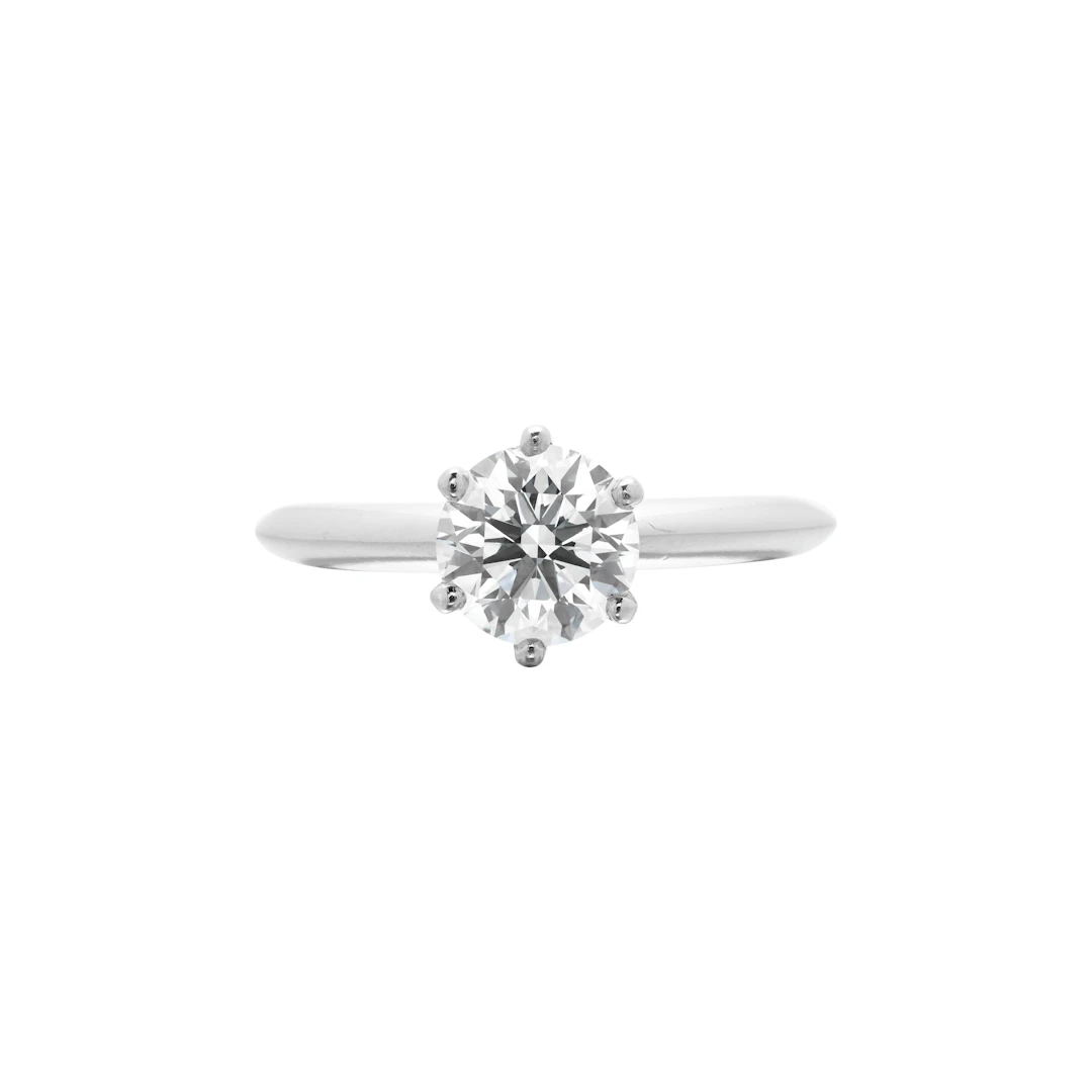 Platinum and 1.07ct Round Brilliant Cut Diamond and Diamond Engagement Ring