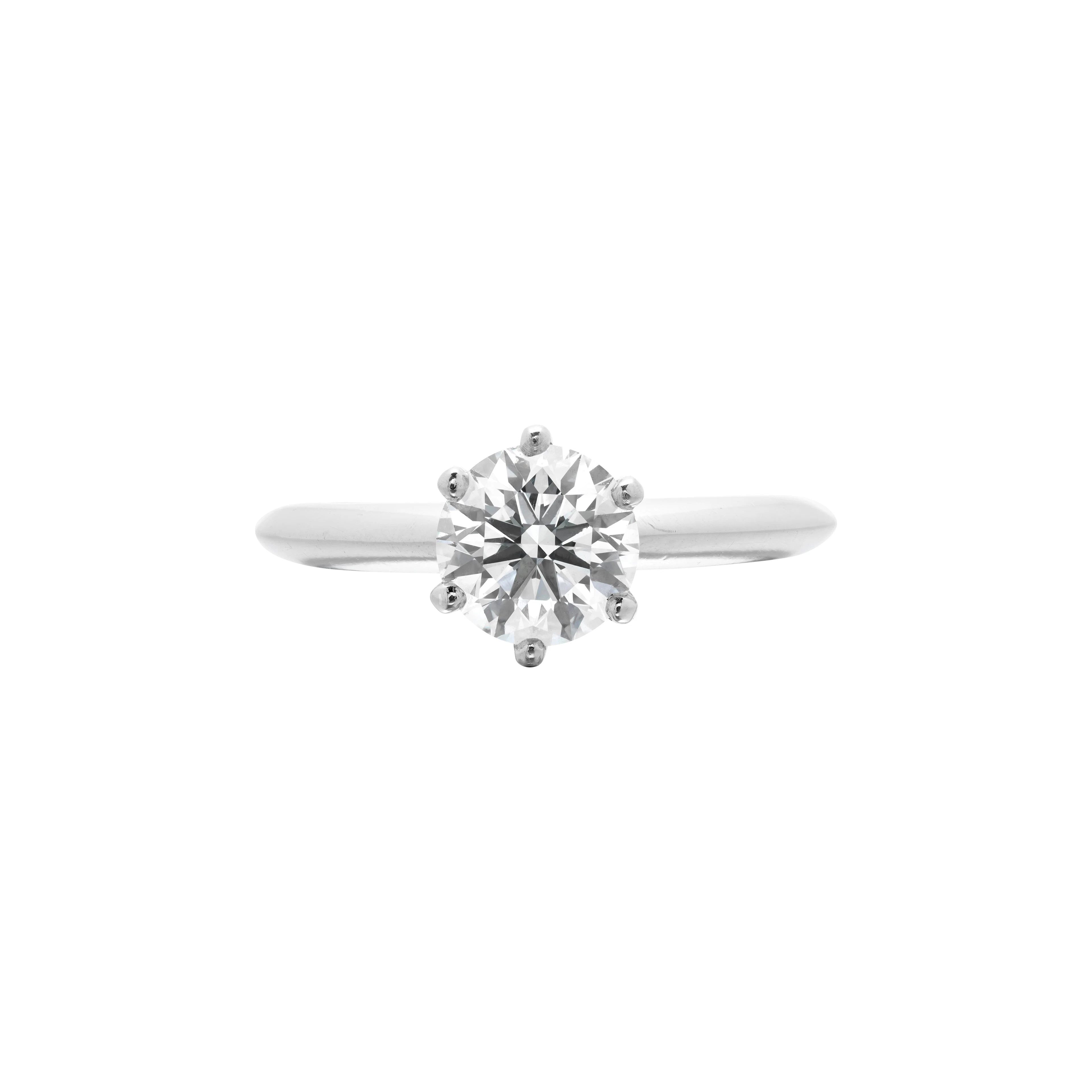 Platinum and 1.07ct Round Brilliant Cut Diamond and Diamond Engagement Ring