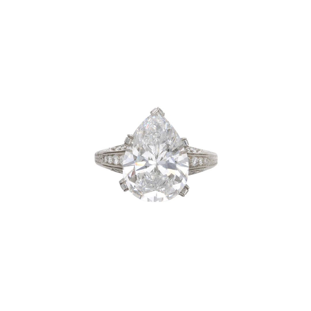 Platinum, 4.97ct Pear Shape Diamond and Diamond Engagement Ring