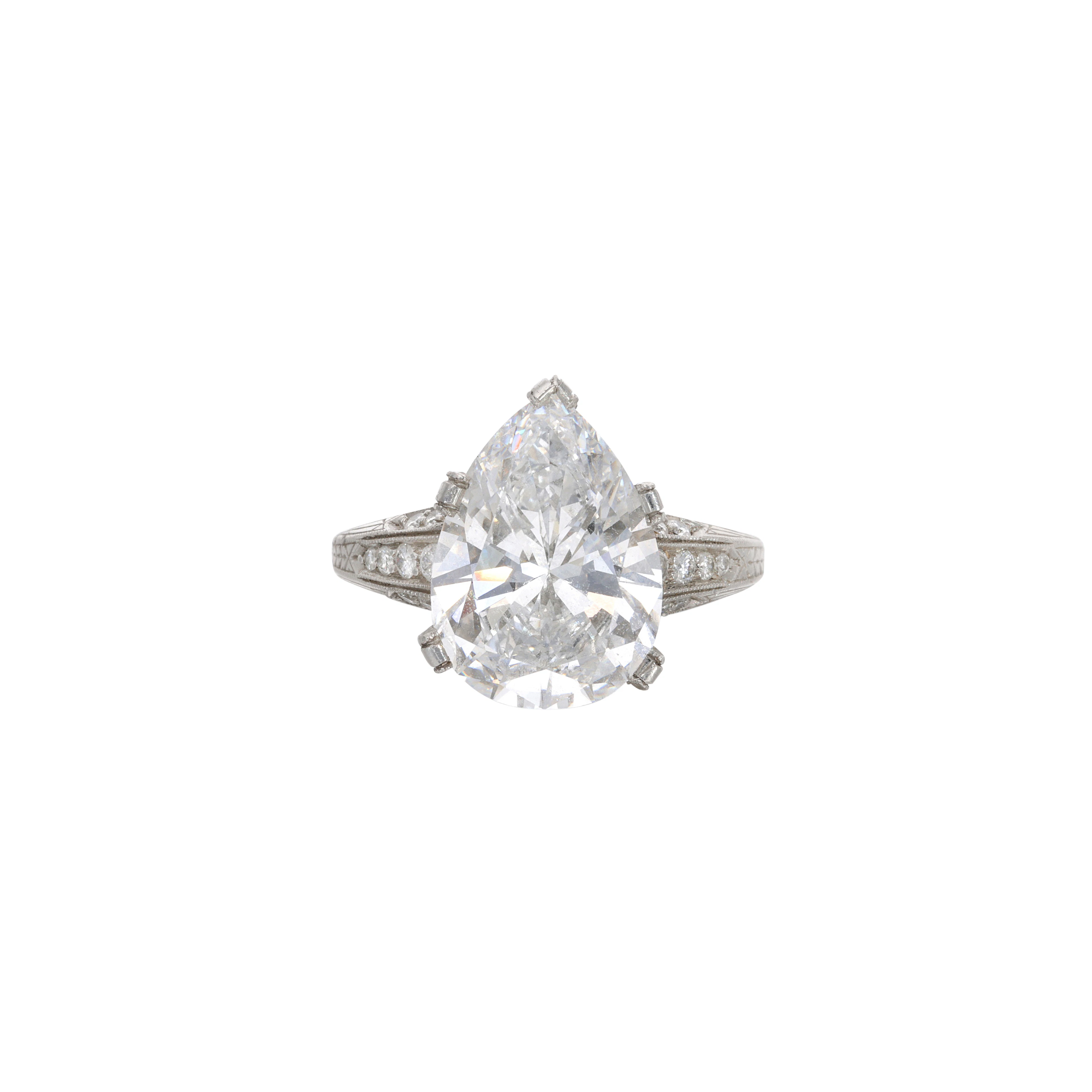 Platinum, 4.97ct Pear Shape Diamond and Diamond Engagement Ring