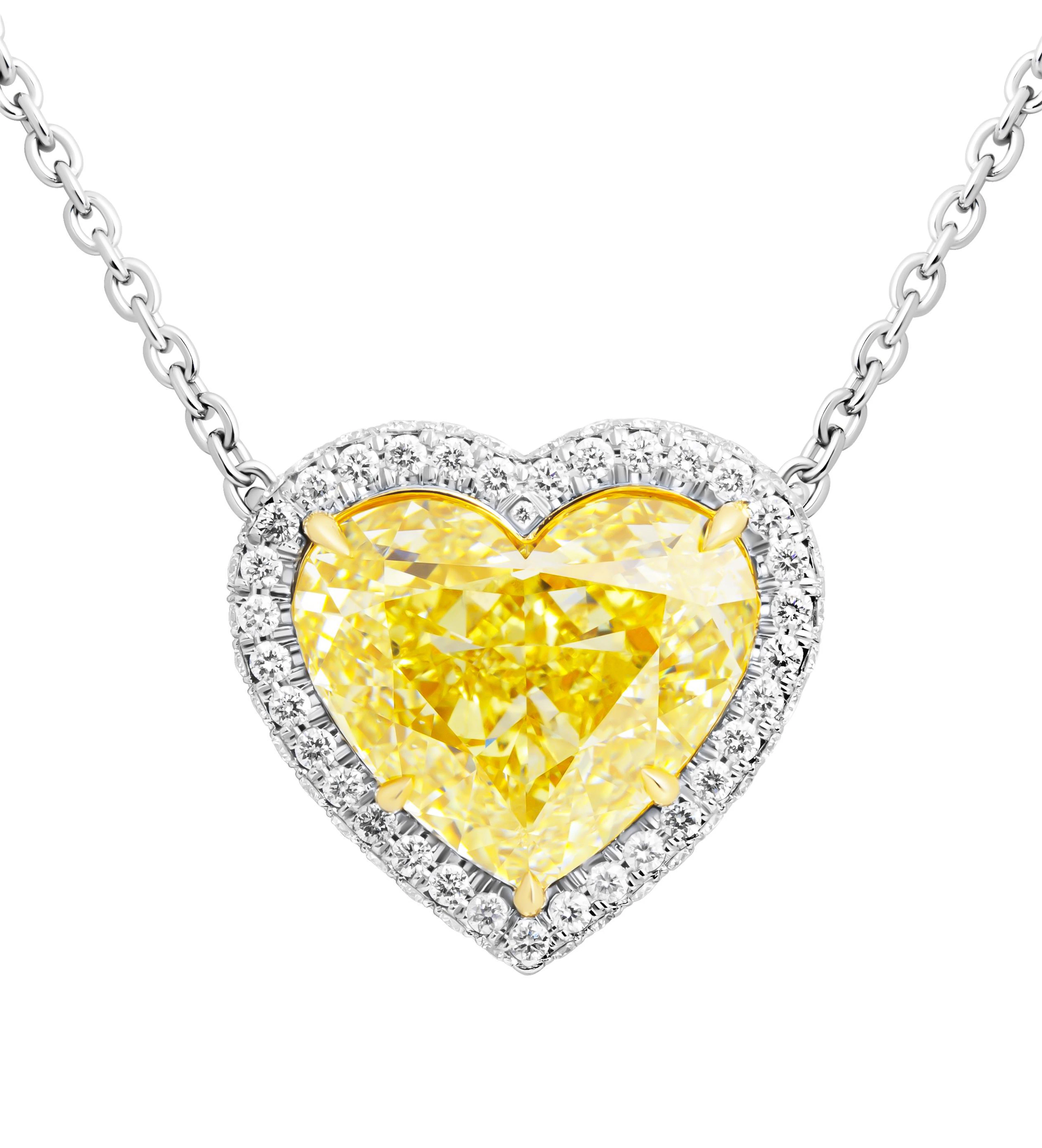 Platinum, Gold, 10.14ct Heart Cut Fancy Yellow Diamond and Diamond