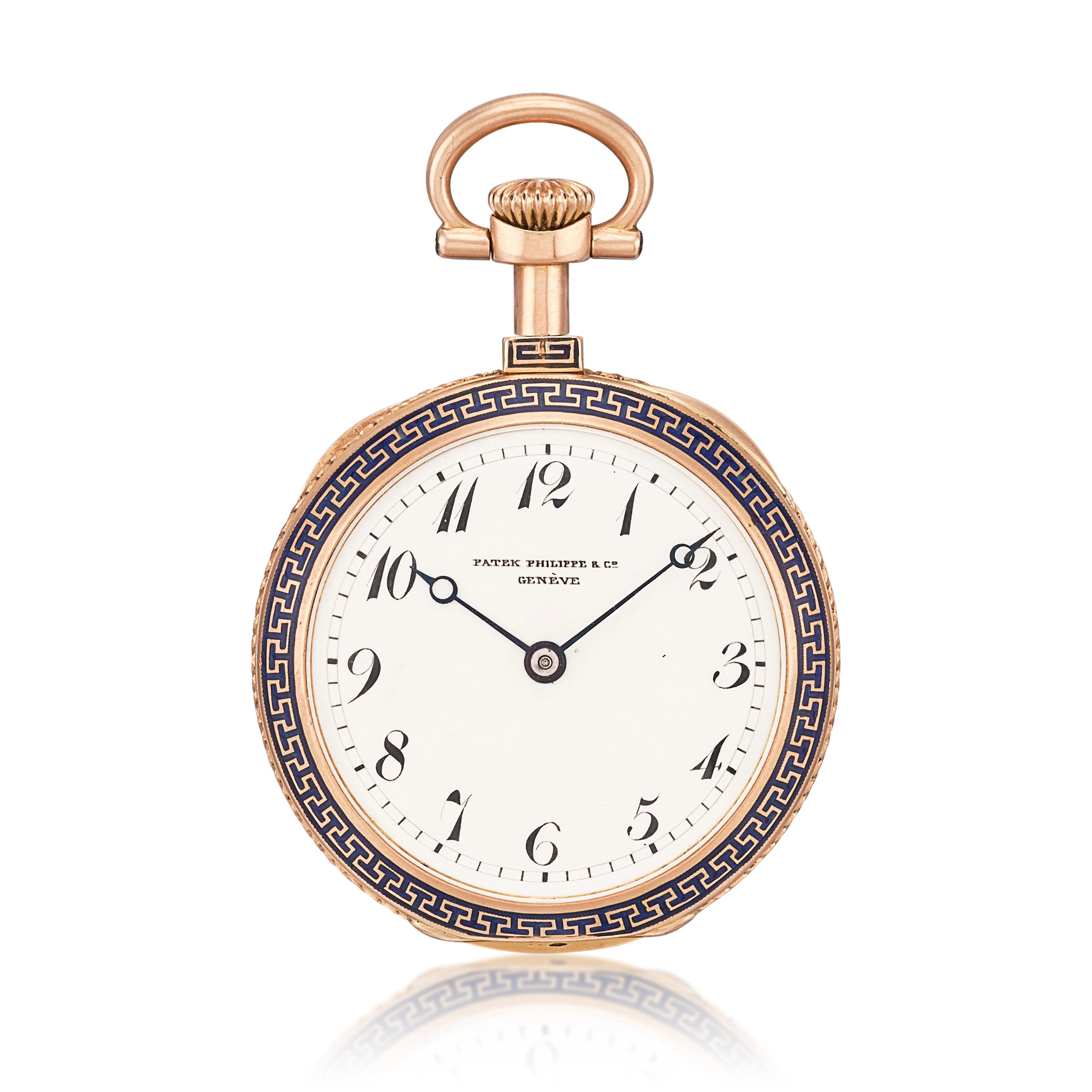 Patek Philippe. A pink gold open face keyless mechanical watch with