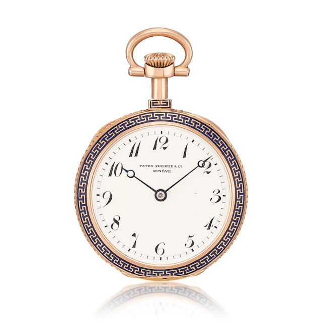 Patek Philippe. A pink gold open face keyless mechanical watch with