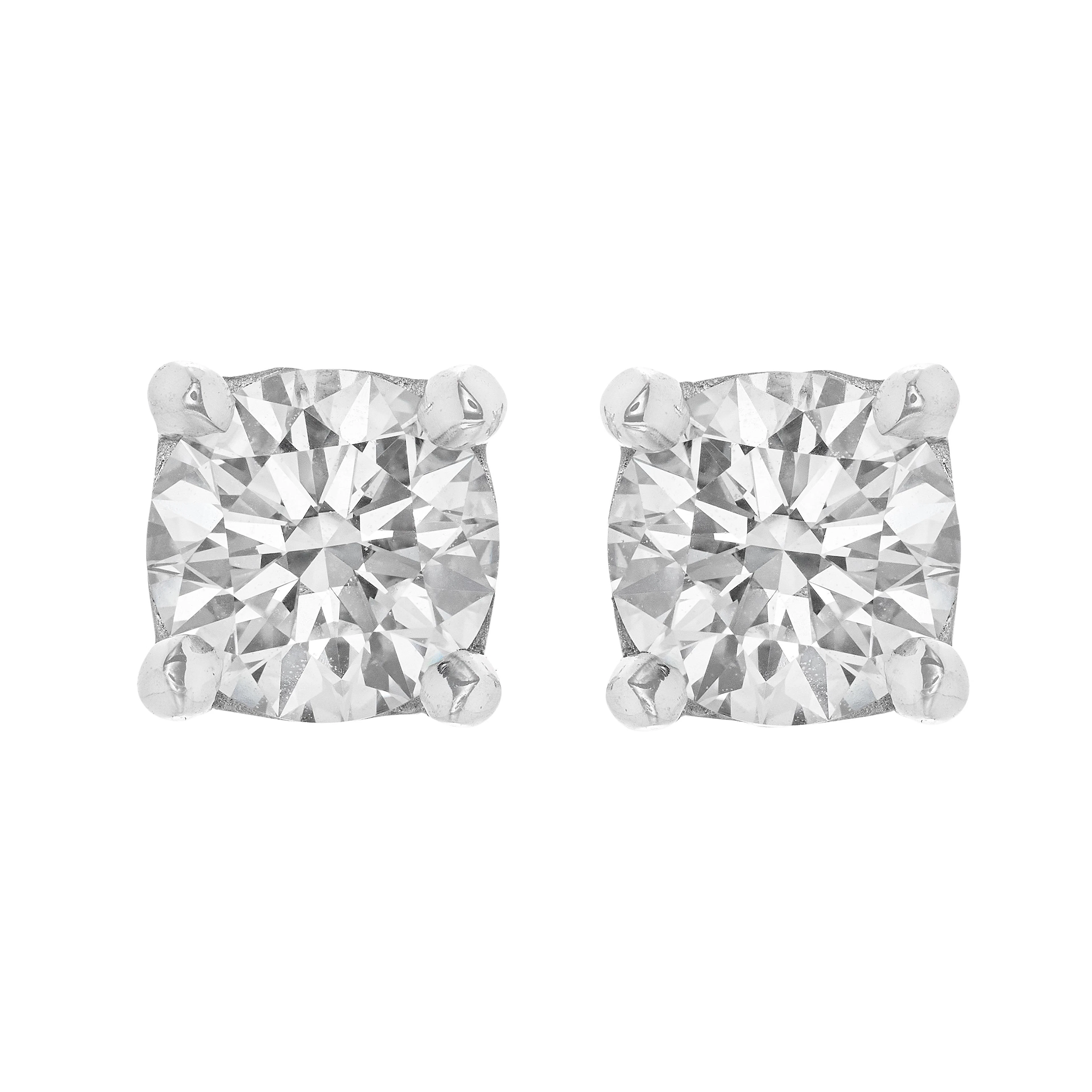 Platinum and 1.16ctw Round Brilliant Cut Diamond Stud Earrings