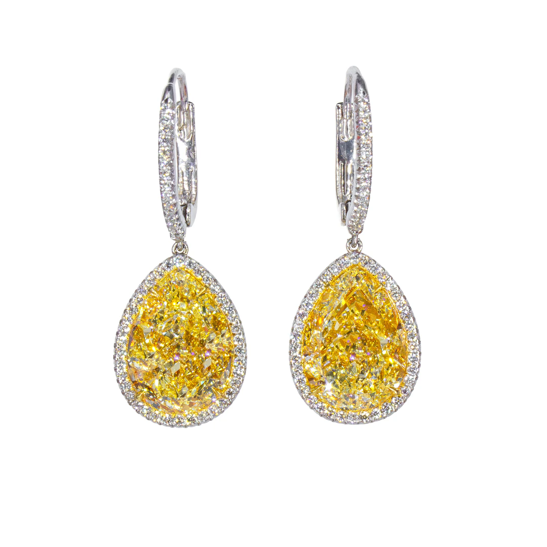 Platinum, Gold, 12.75ctw Pear Shape Fancy Yellow Diamond and Diamond