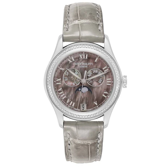 Complication (Reference 4936G). A 37mm white gold diamond set automatic