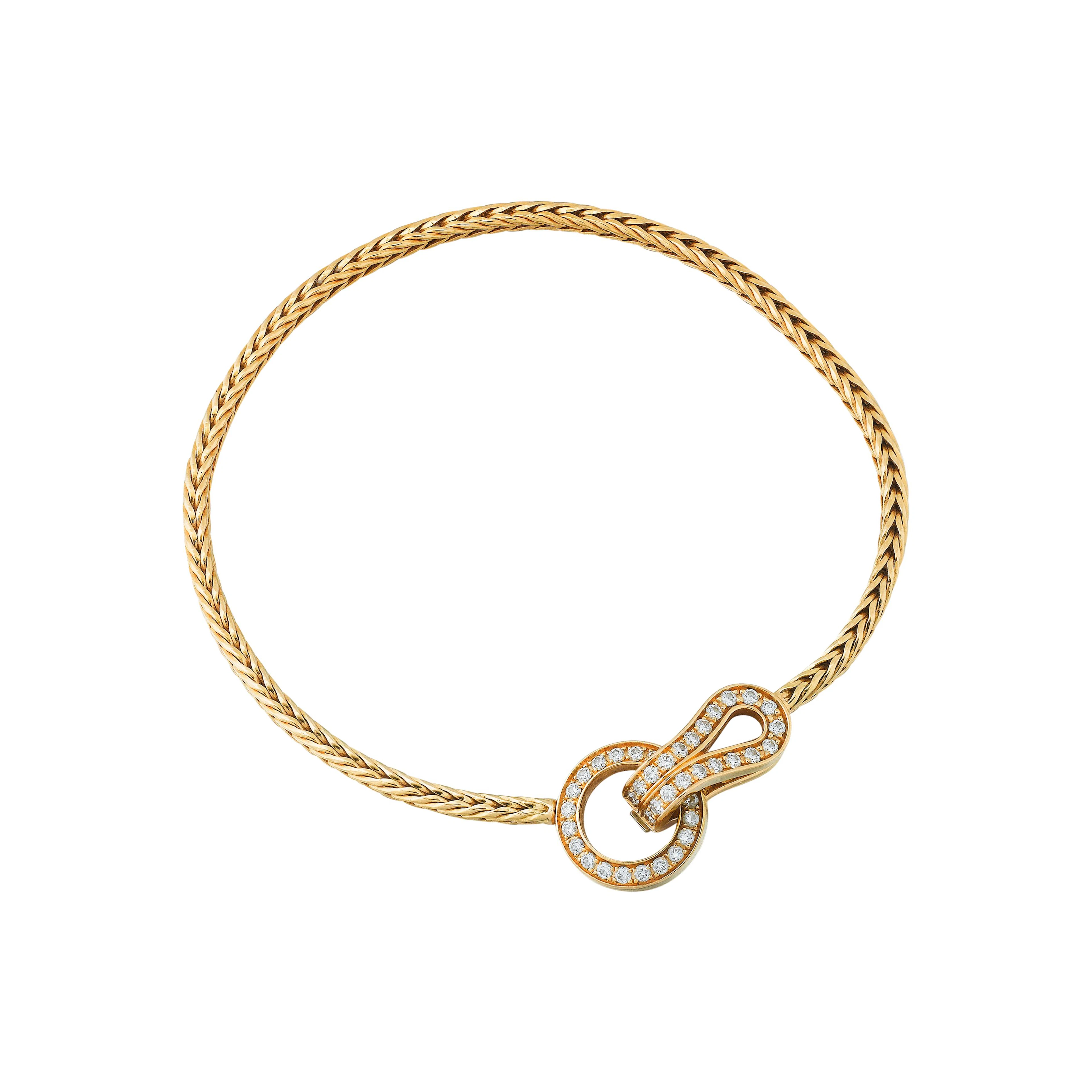 Bracelet or jaune et diamants, "Agrafe" | Gold and diamond bracelet, 'Agrafe'
