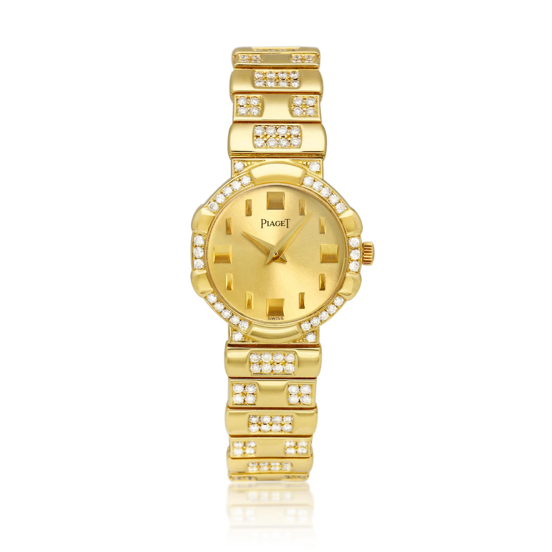 (Reference 8601). A yellow gold and diamond-set quartz bracelet watch.