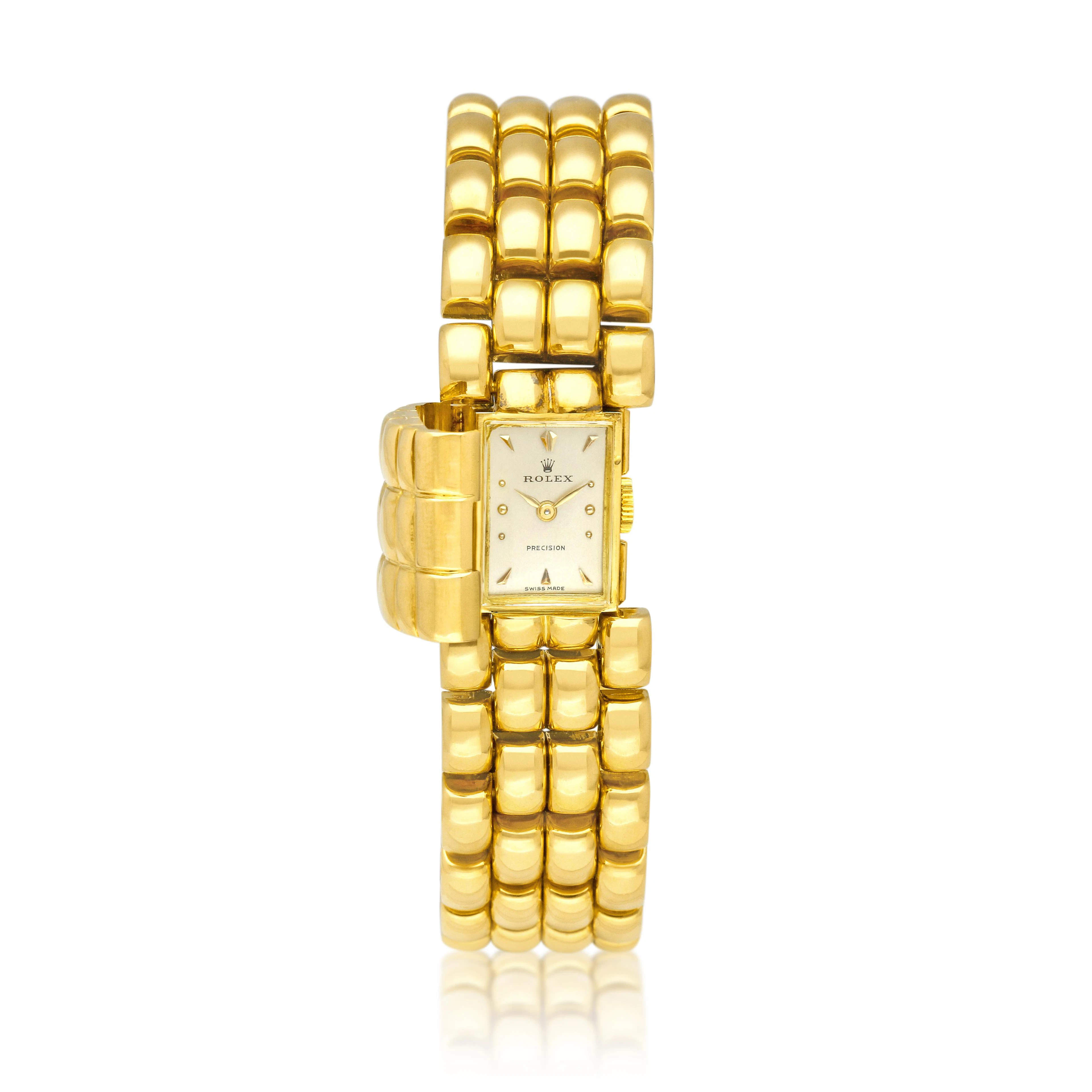 Rolex. A yellow gold manual wind bracelet watch with concealed dial. Circa 1948