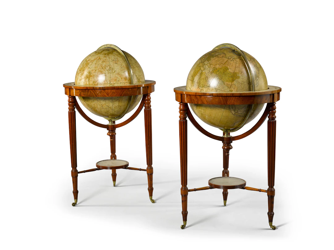 A pair of Regency 21-inch terrestrial and celestial library globes