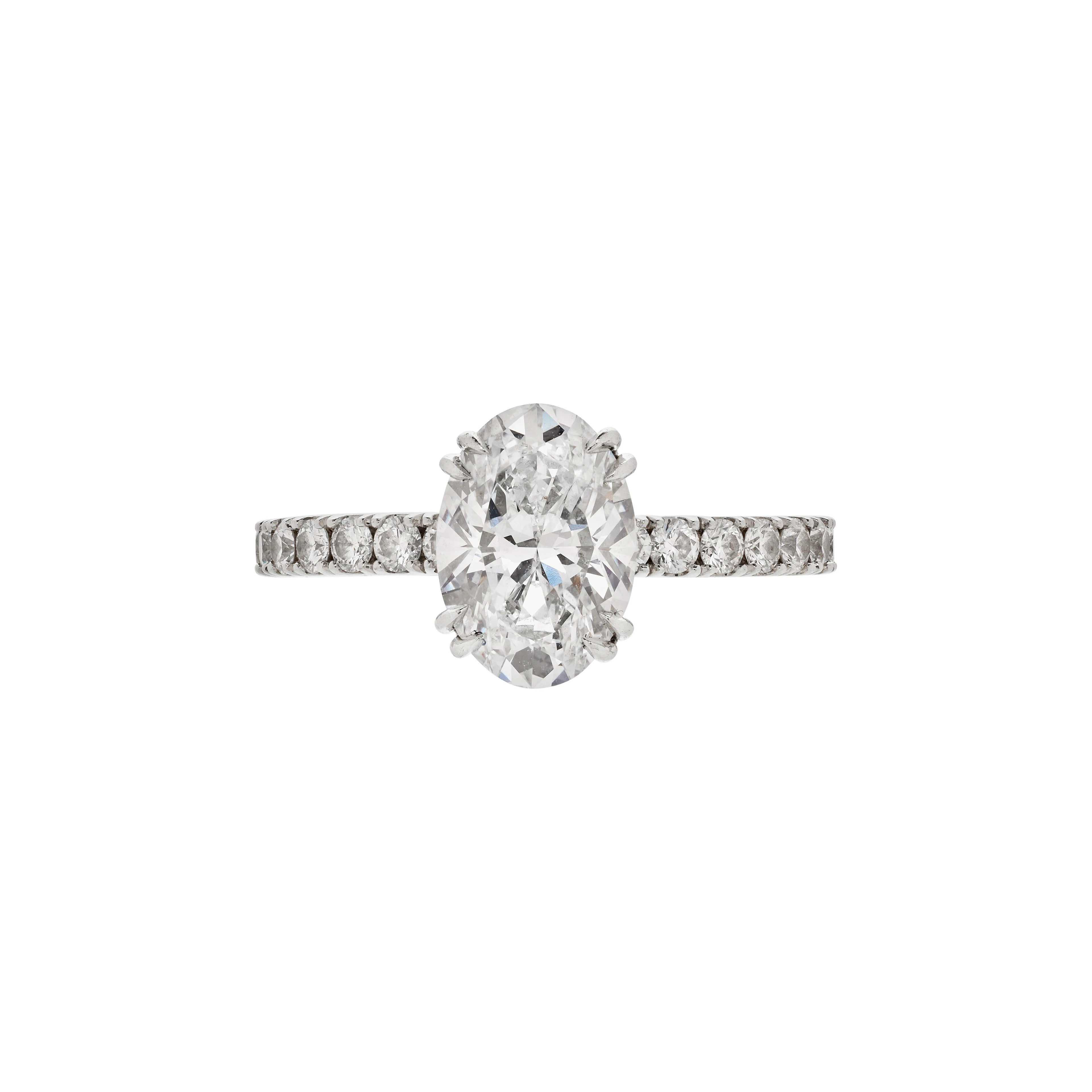 Platinum, 1.53ct Oval Cut Diamond and Diamond Engagement Ring