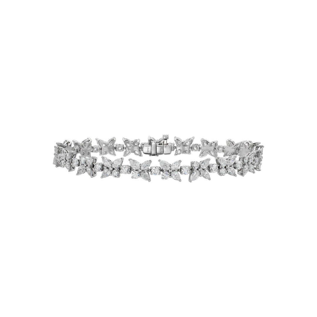Platinum and 6.25ctw Fancy Cut Diamond Mixed Cluster Victoria Bracelet