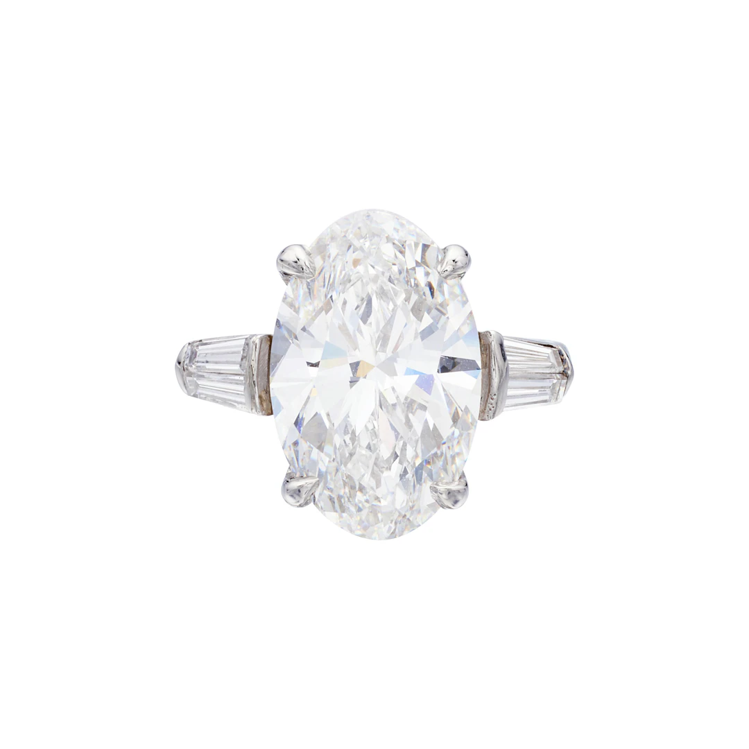 Platinum, 7.20ct Oval Cut Diamond and Diamond Engagement Ring