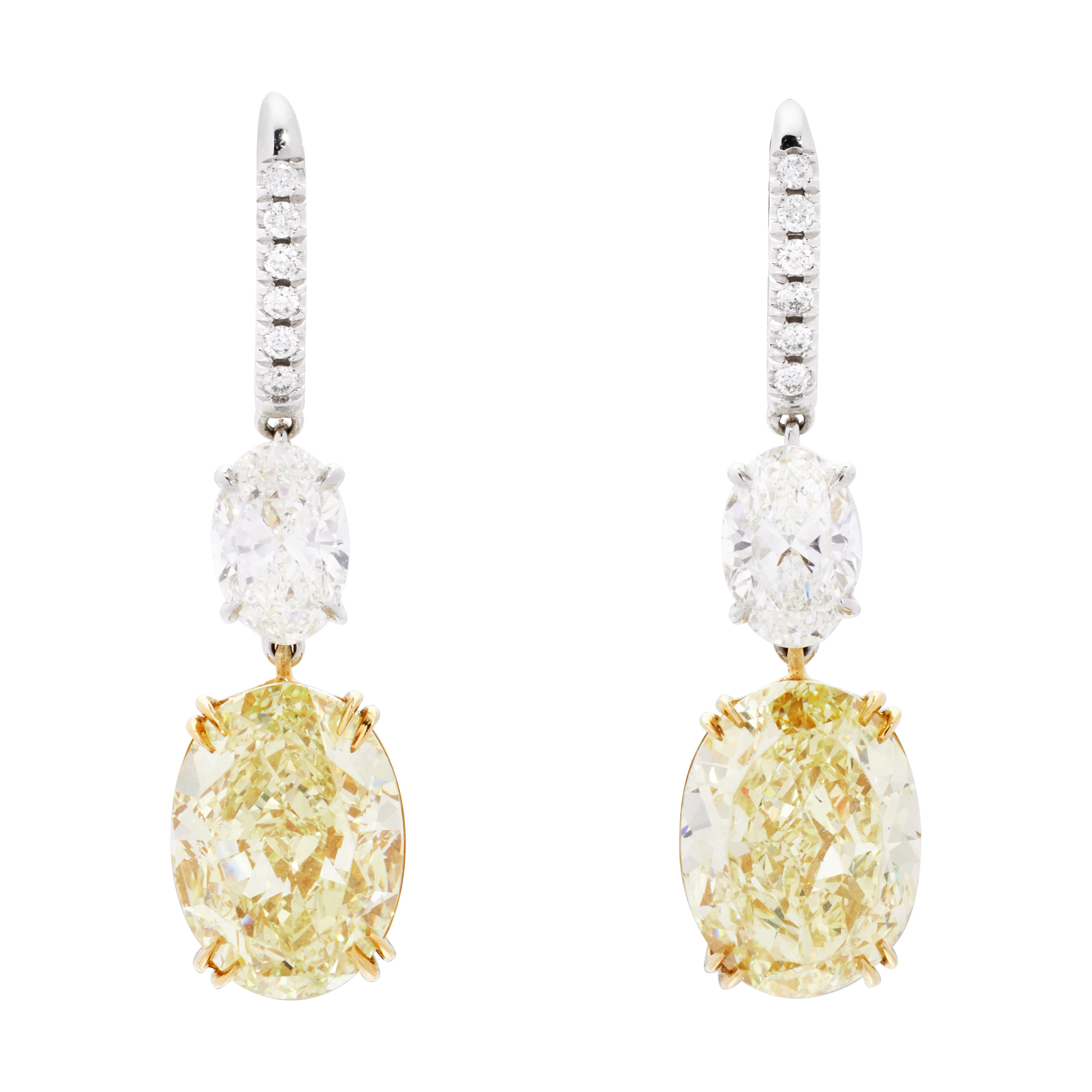 Platinum, Gold, 16.83ctw Oval Cut Fancy Yellow Diamond and Diamond