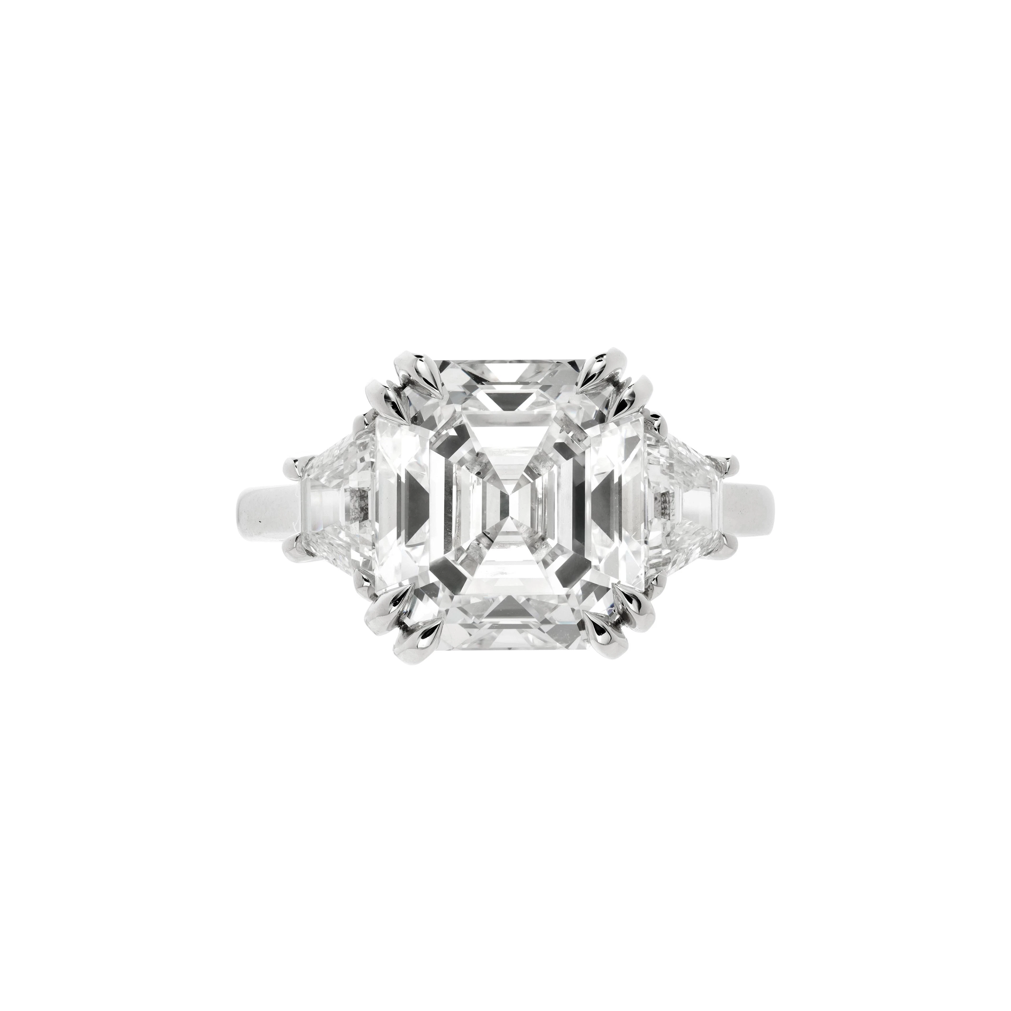 Platinum and 5.67ct Asscher Cut Diamond Three Stone Engagement Ring