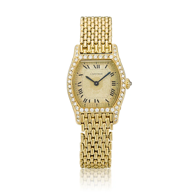 Tortue (Reference 96070). A 22.5mm yellow gold and diamond-set wristwatch. 1980