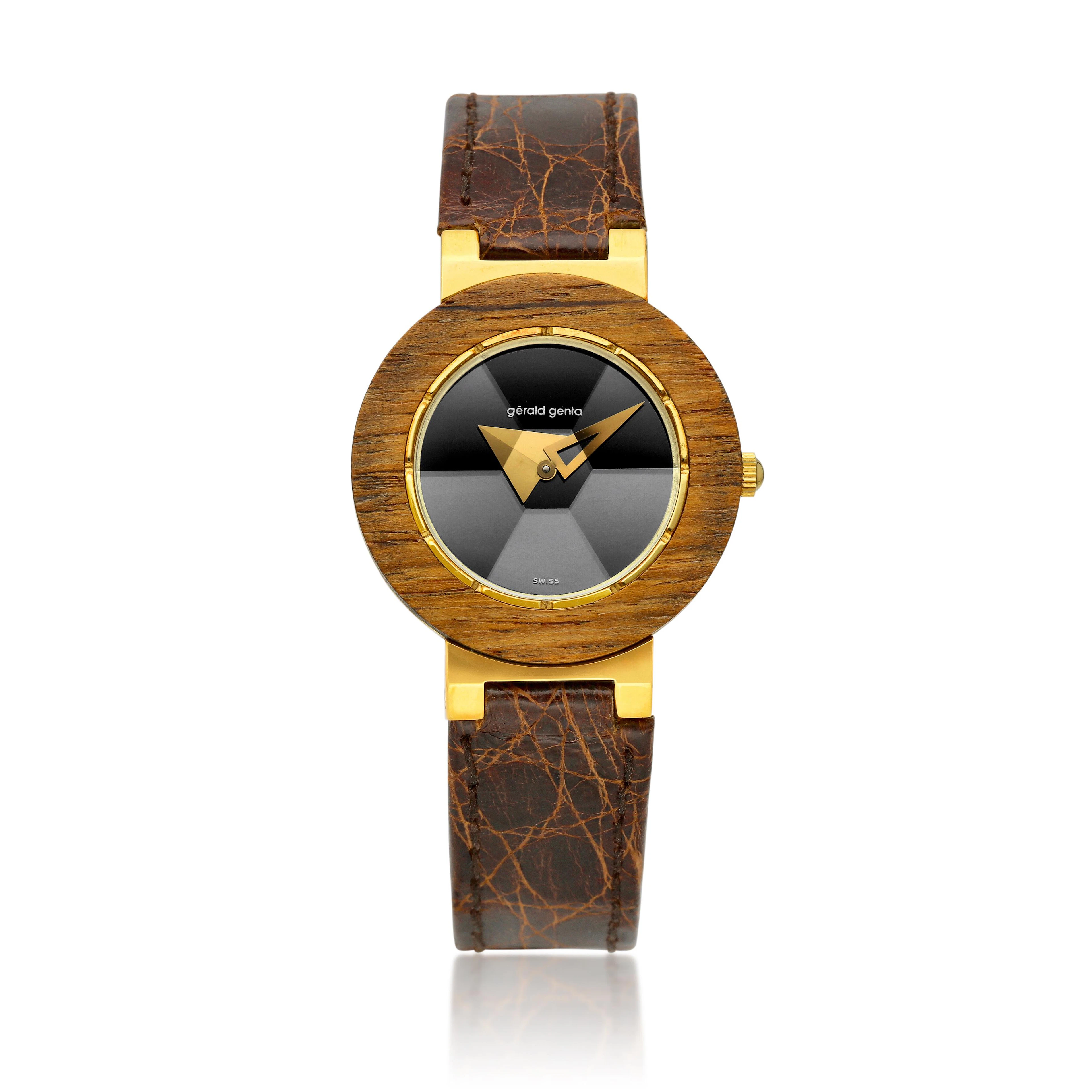 (Reference 3114.7) A yellow gold and wood quartz wristwatch. Circa 1990
